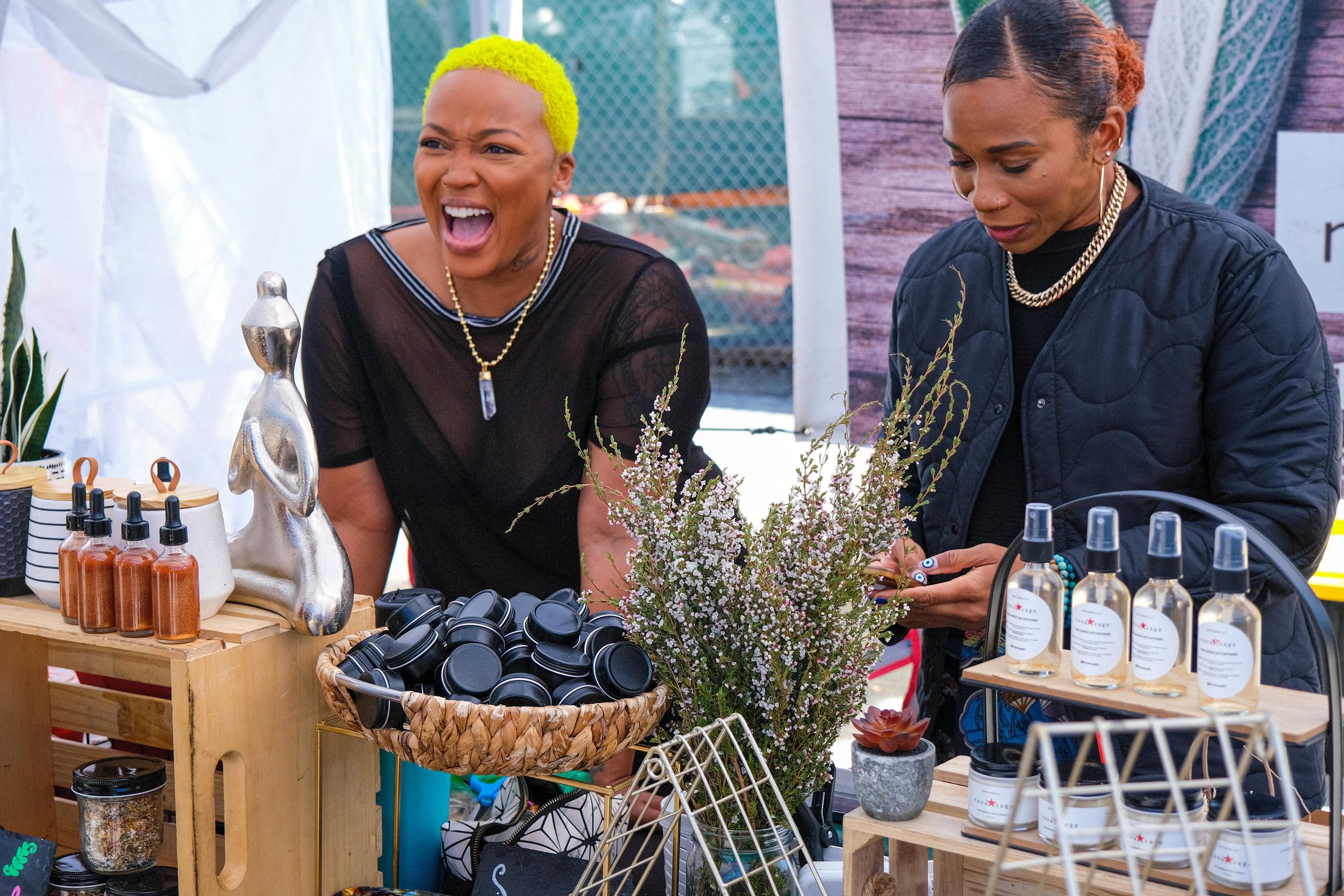  Jessica Gabrielle (left) shares a laugh with a customer, next to Ashley Rian (right). They are co-owners of Nova Sage. Vegan Exchange in North Hollywood, Calif on Sunday, March 20, 2022 (Anna Sophia Moltke | The Corsair) 