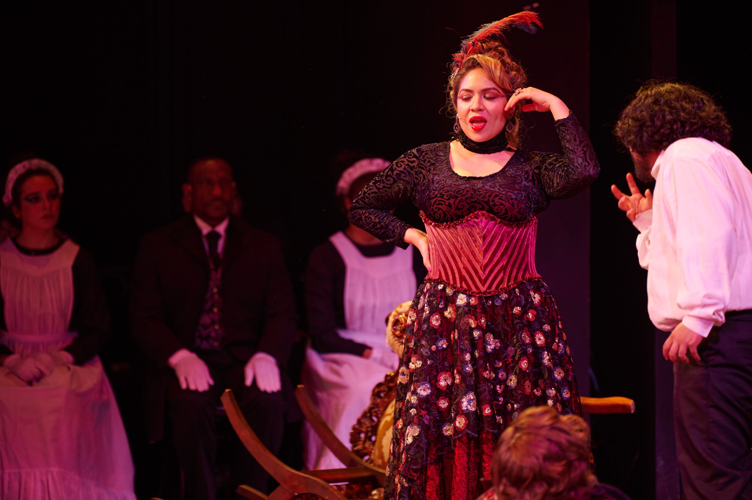  Marina Portillo (center), A.J. Sohrabi (right), and in the background, Saba Asgari (Maid #3), and Clarence Alonzo (Butler #3), perform during a dress rehearsal of the Santa Monica College Theatre Arts Department production of "The Strange Case of Dr