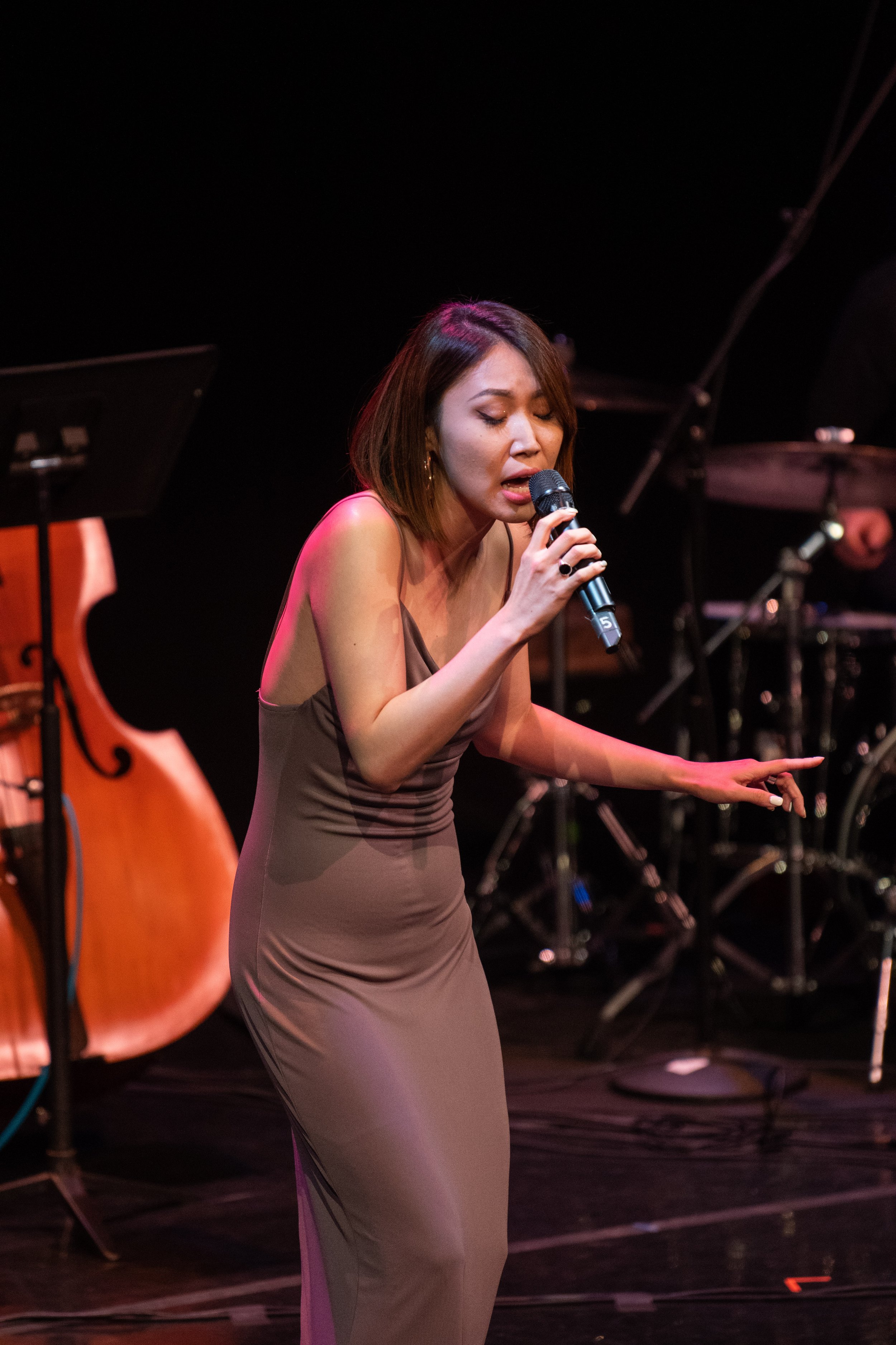  Jodie (Yueun) Lee sings alongside an ensemble during the Applied Music Showcase on Friday, May 6, 2022 in Santa Monica, Calif. The Applied Music Showcase is a semester tradition in which students show their hard work and scholarships are announced f