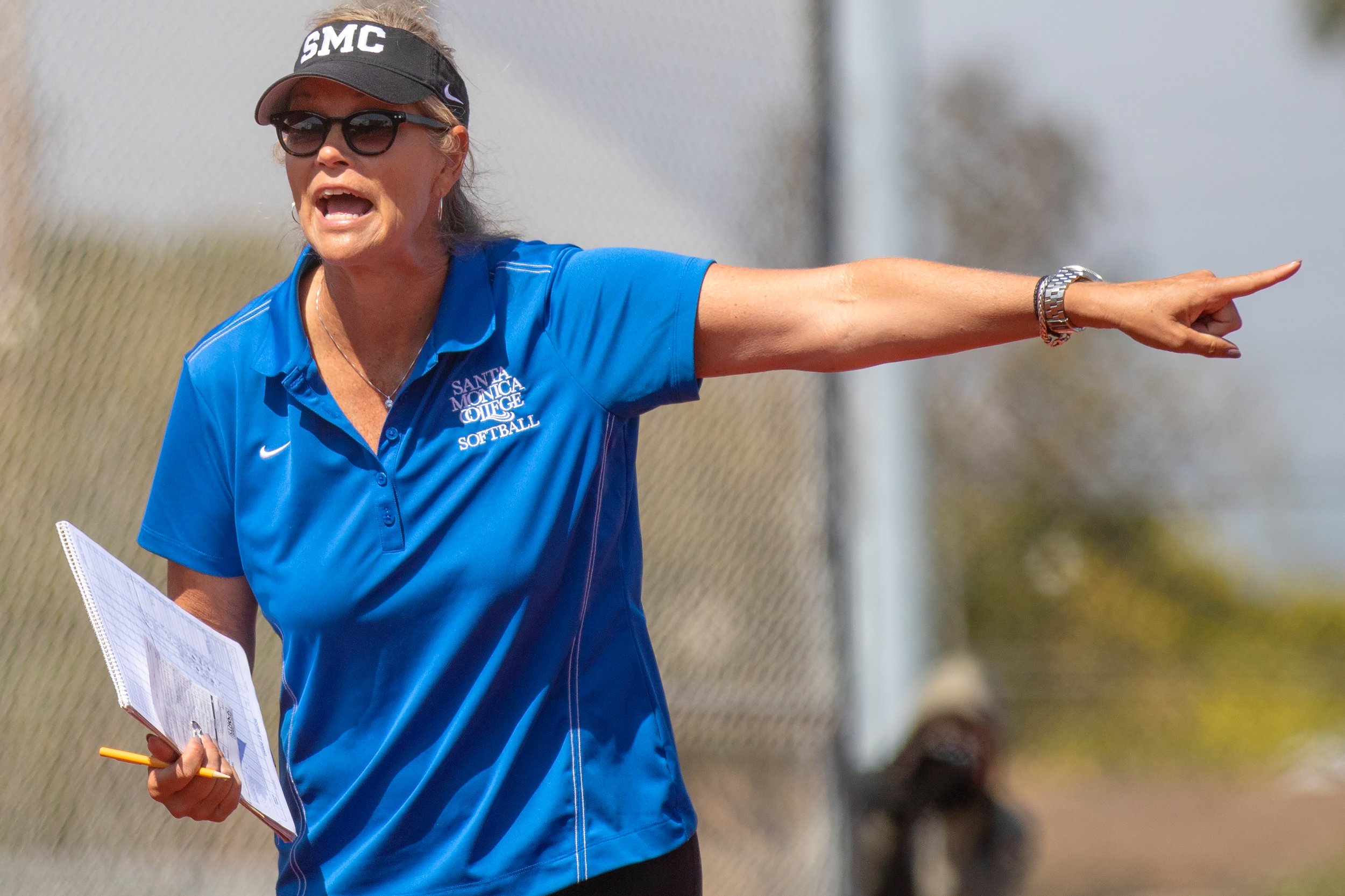  Santa Monica College Corsairs head coach Chris Druckman yelling to give some instructions to her players during the game with Ventura College on Tuesday, Apr. 26, at the John Adams middle school field in Santa Monica Calif. (Adrian Chan | The Corsai