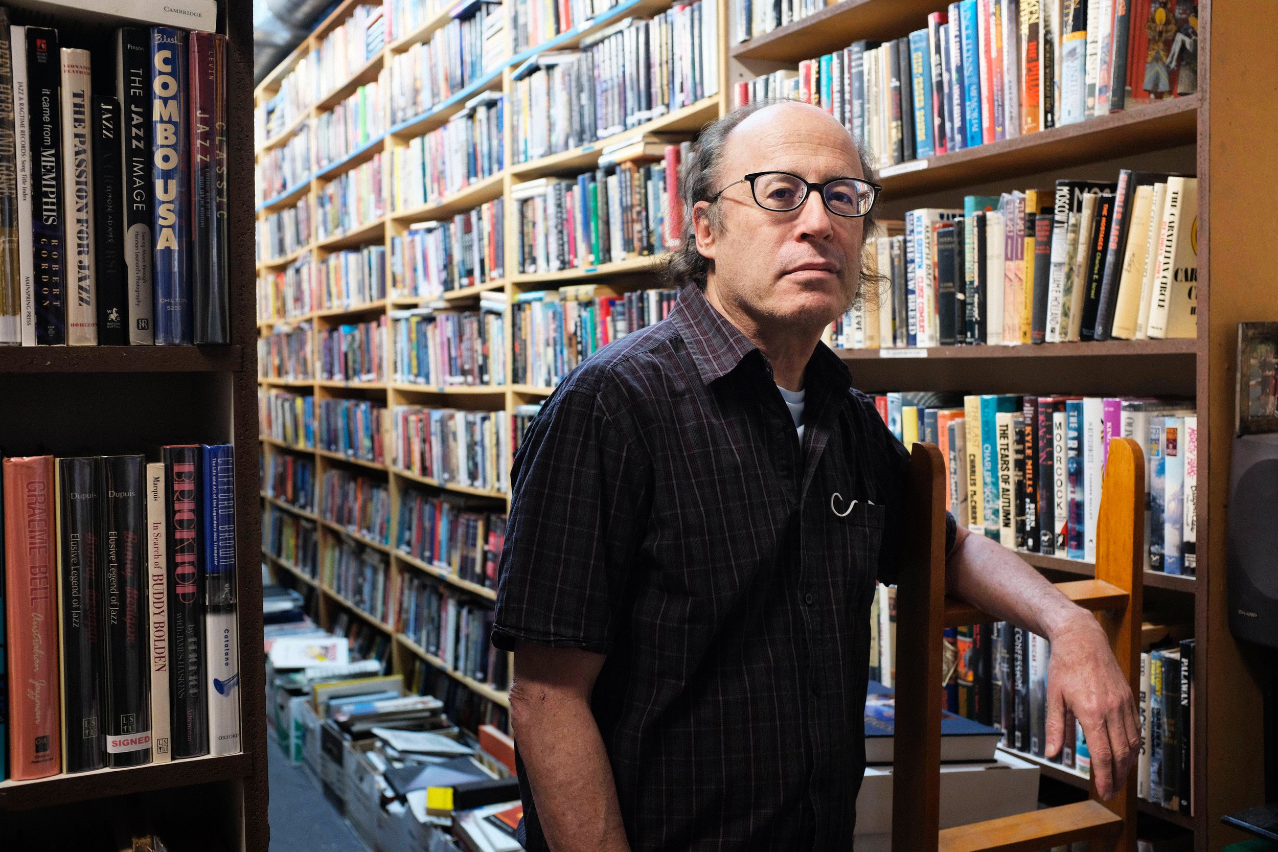  Barry Lancet (cq) visits from Tokyo and stops by David Kaye’s book store to have the owner price a selection that he has collected.  Lancet himself is an author, and regular of David Kaye’s bookstore whenever he visits Los Angles. David Kaye Booksto