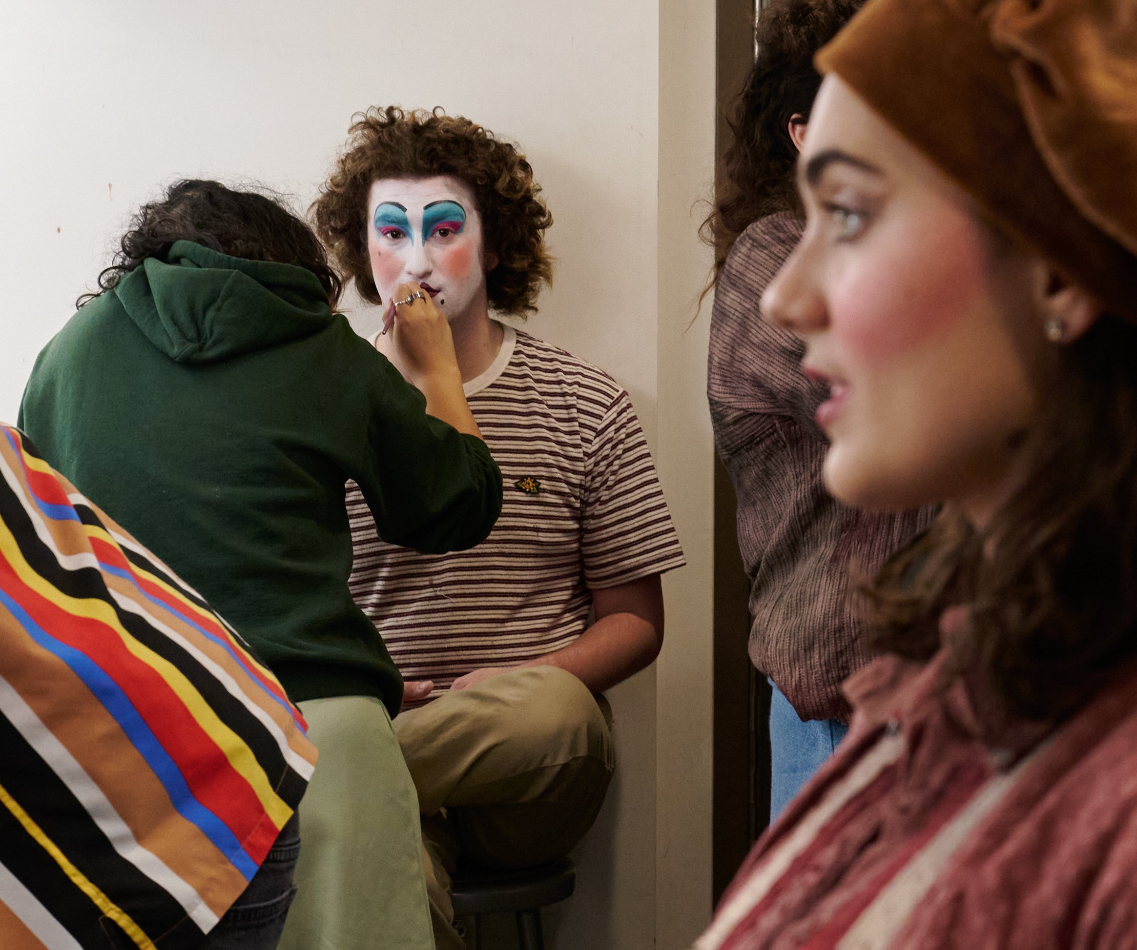  Desh Johnson (left), Jordi Kligman (center), and Justine Marin (right) prepare in the dressing room backstage before a performance of the Santa Monica College Theatre Arts production of "Treasure Island" at the SMC Main Stage on Sunday, May 22, 2022