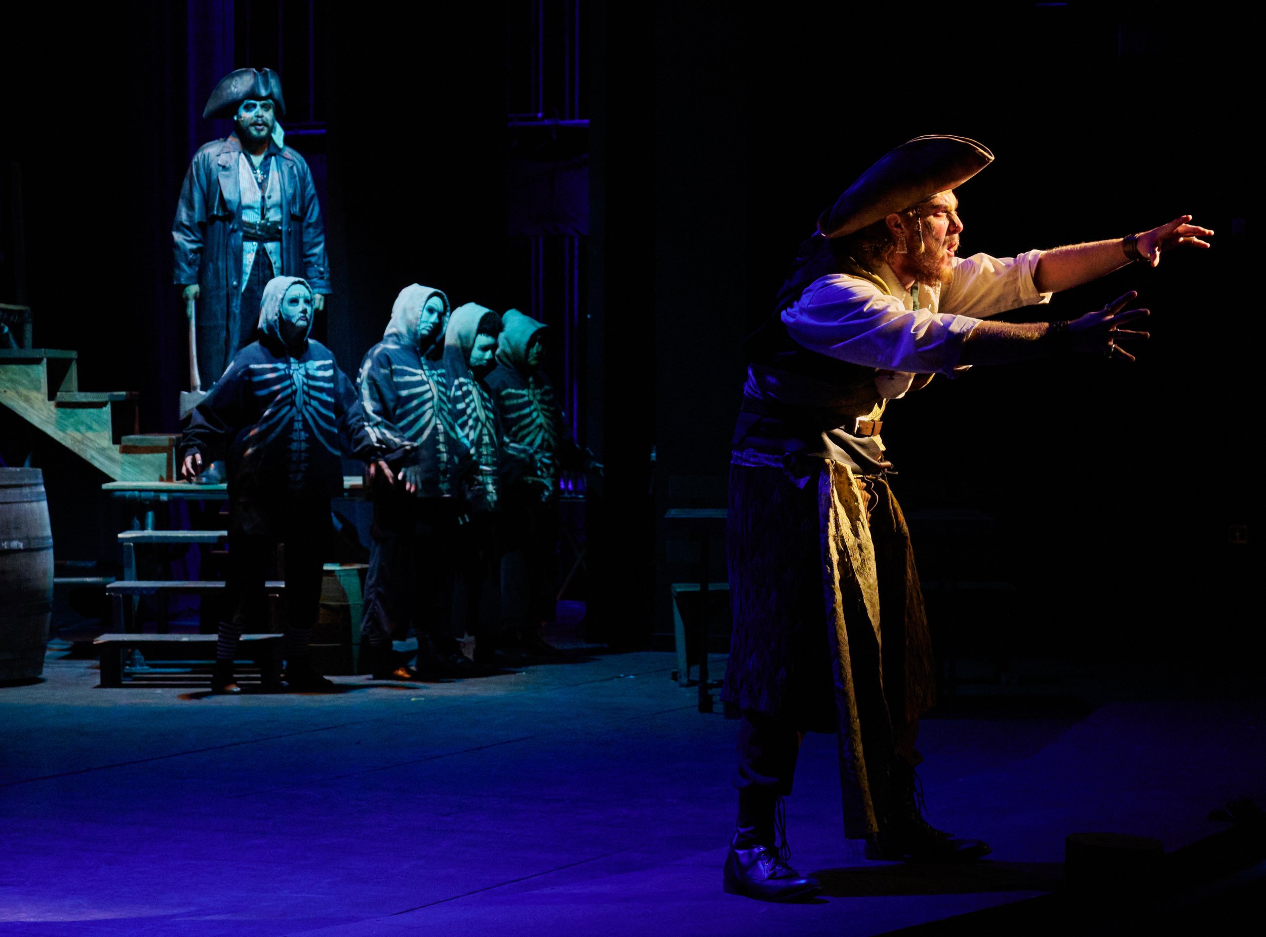  Abram Cervantes (left), Justin Valine (right), and cast during a performance of the Santa Monica College Theatre Arts production of "Treasure Island" at the SMC Main Stage on Sunday, May 22, 2022, in Santa Monica, Calif. (Nicholas McCall | The Corsa