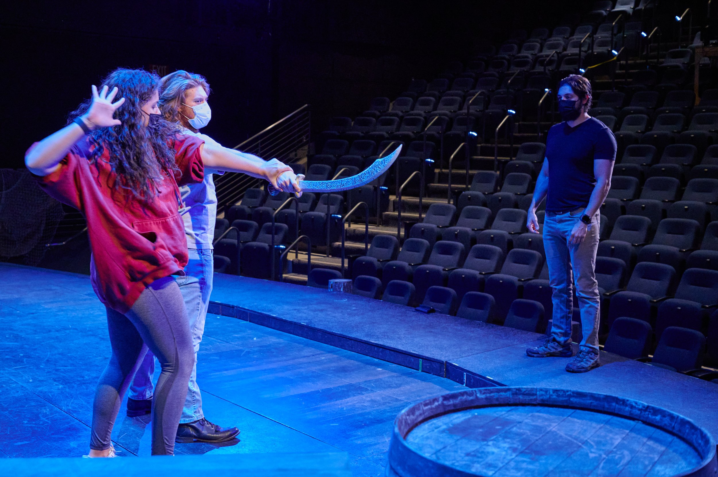  Fight Choreographer Ryan Dylan Wargnier (right) works with Savannah Haislip (left) and Justin Valine (center) during rehearsal of the Santa Monica College Theatre Arts production of "Treasure Island" at the SMC Main Stage on Thursday, May 12, 2022, 