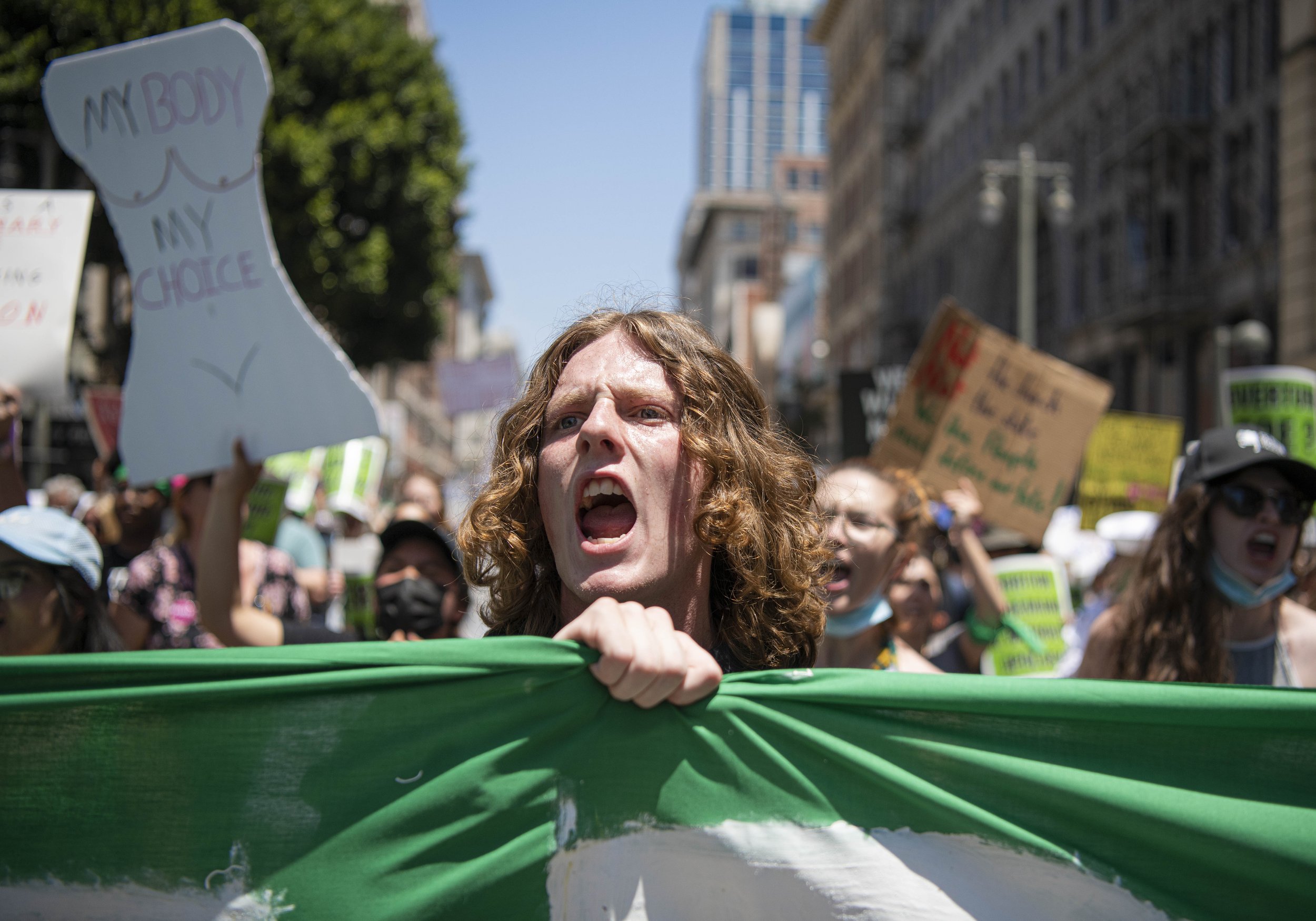  An abortion rights supporter yells as he joins in on the crowds chants on May 14, 2022, in Los Angeles, CA. (Jon Putman | The Corsair) 