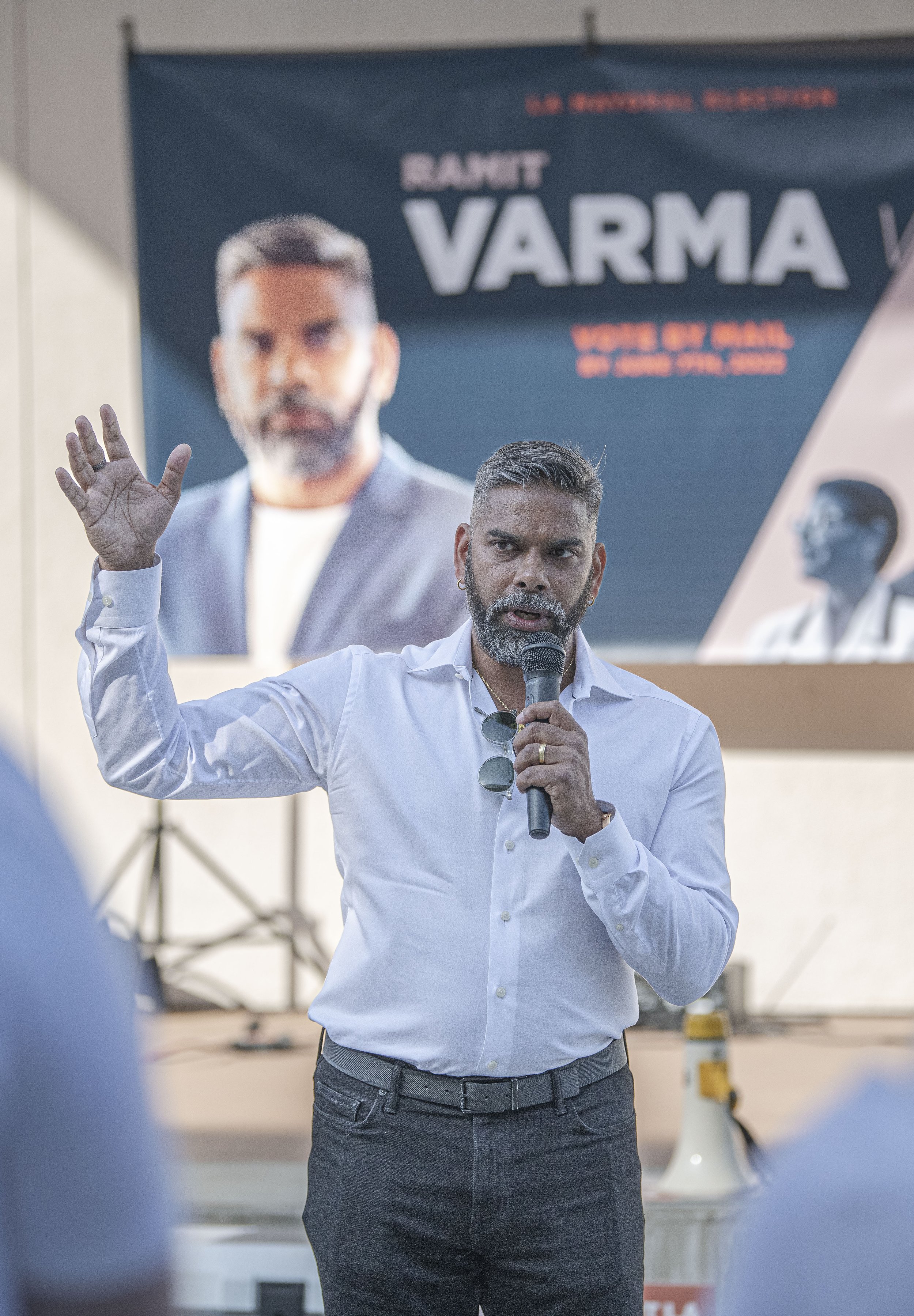  Ramit Varma a candidate for the 2022 Los Angeles Mayoral debate campaigns outside the doors of the debate in which he was not invited to on Sunday May 1, 2022 at the Mayoral debate held at California State University Los Angeles. (Jon Putman | The C
