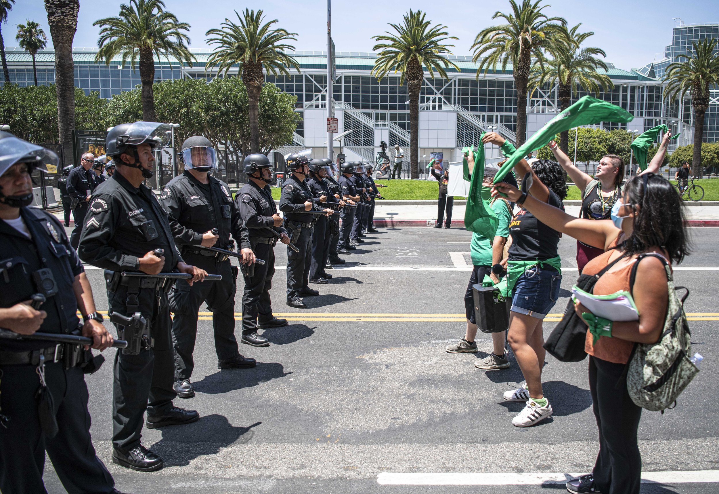  Los Angeles police stand face to face with protestors outside the 9th Annual Summit being held at the Convention Center DTLA. (Jon Putman | The Corsair) 