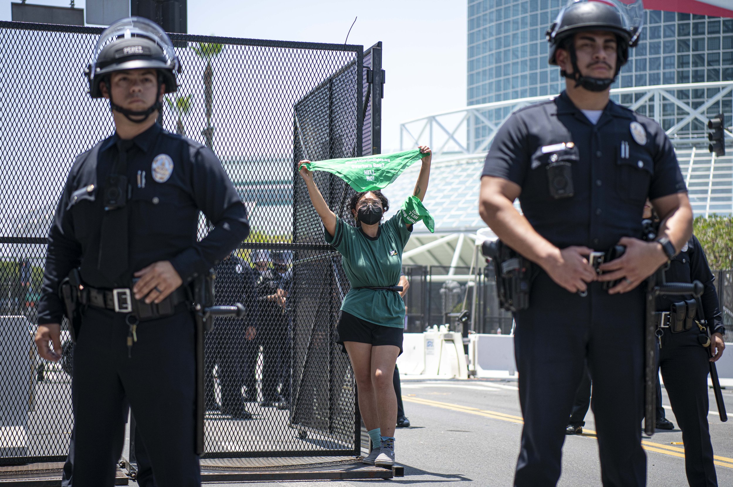  An Abortion rights protestor chains herself to the entrance gates of the Convention Center where the 9th annual summit is being held. (Jon Putman | The Corsair) 