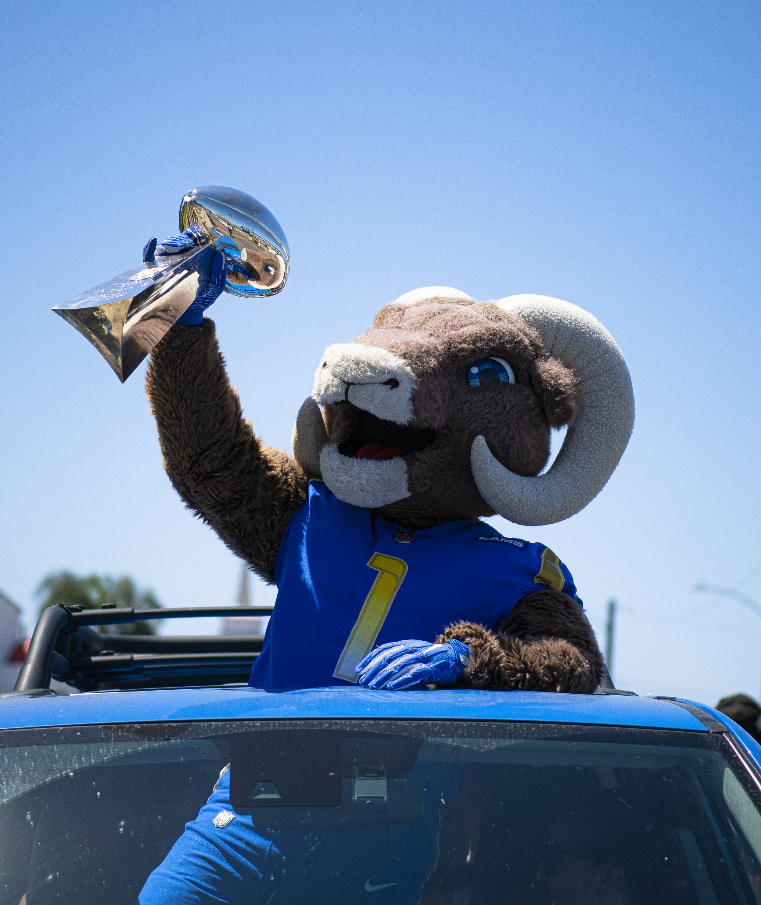  Rampage the Los Angeles Rams Mascot holds the Vince Lombardi trophy as they lead the Juneteenth parade. (Jon Putman | The Corsair) 