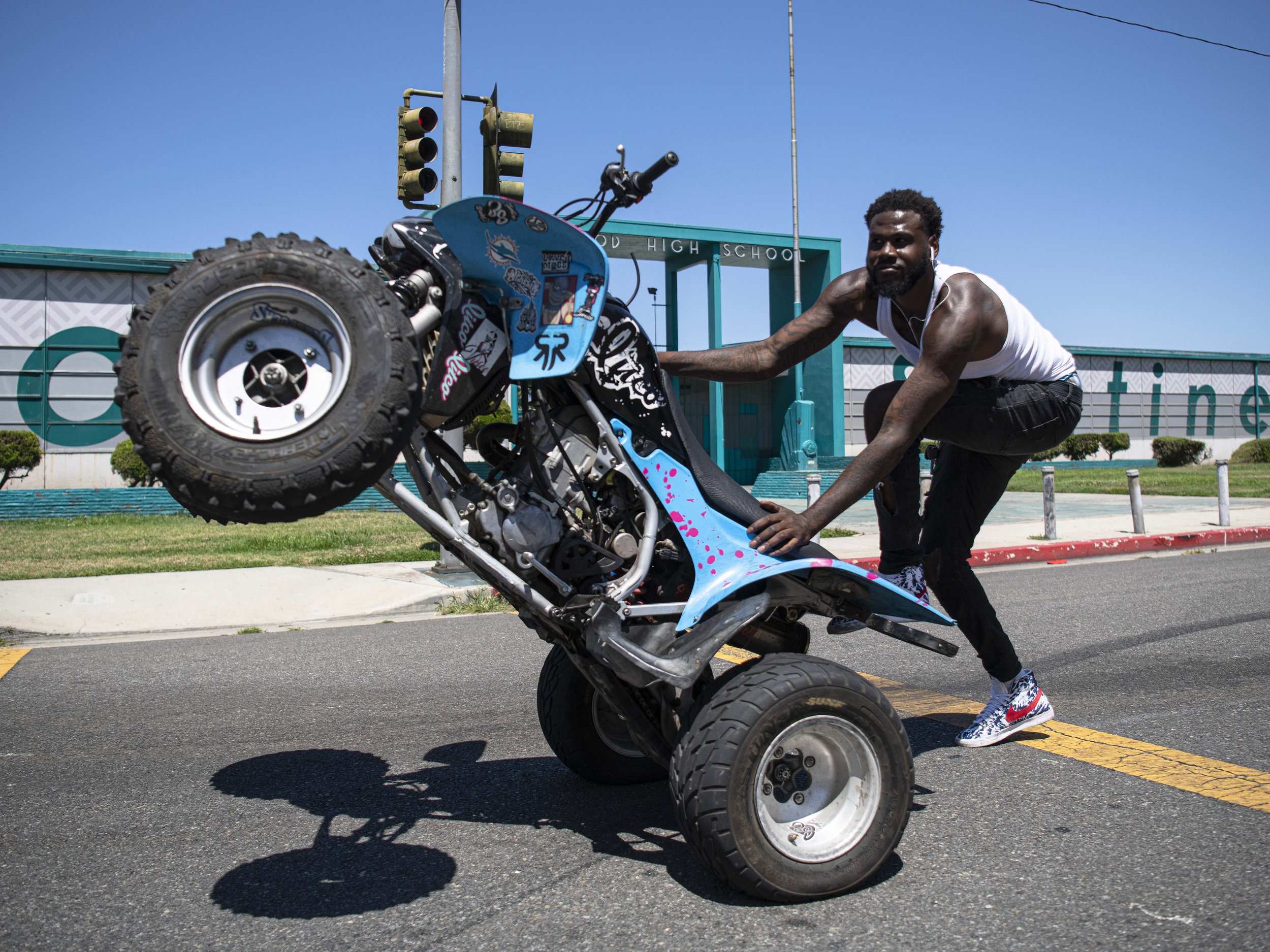  A Juneteenth participant performs stunts on his 4 Wheeler in front police and the curious public (Jon Putman | The Corsair) 