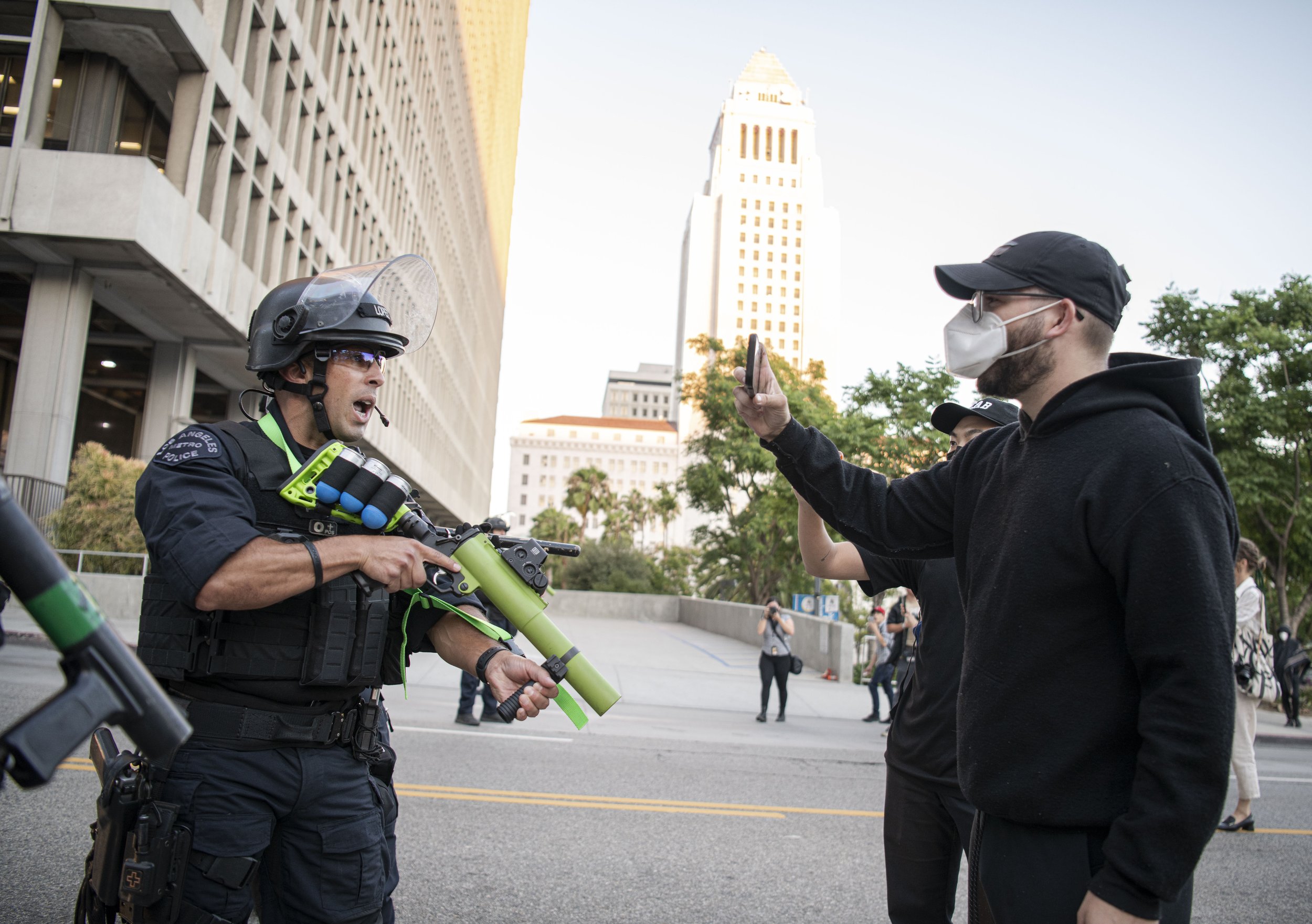  An Abortion Rights supporter gets face to face with a LAPD officer as the rally cocludes in front of City Hall. (Jon Putman | The Corsair) 