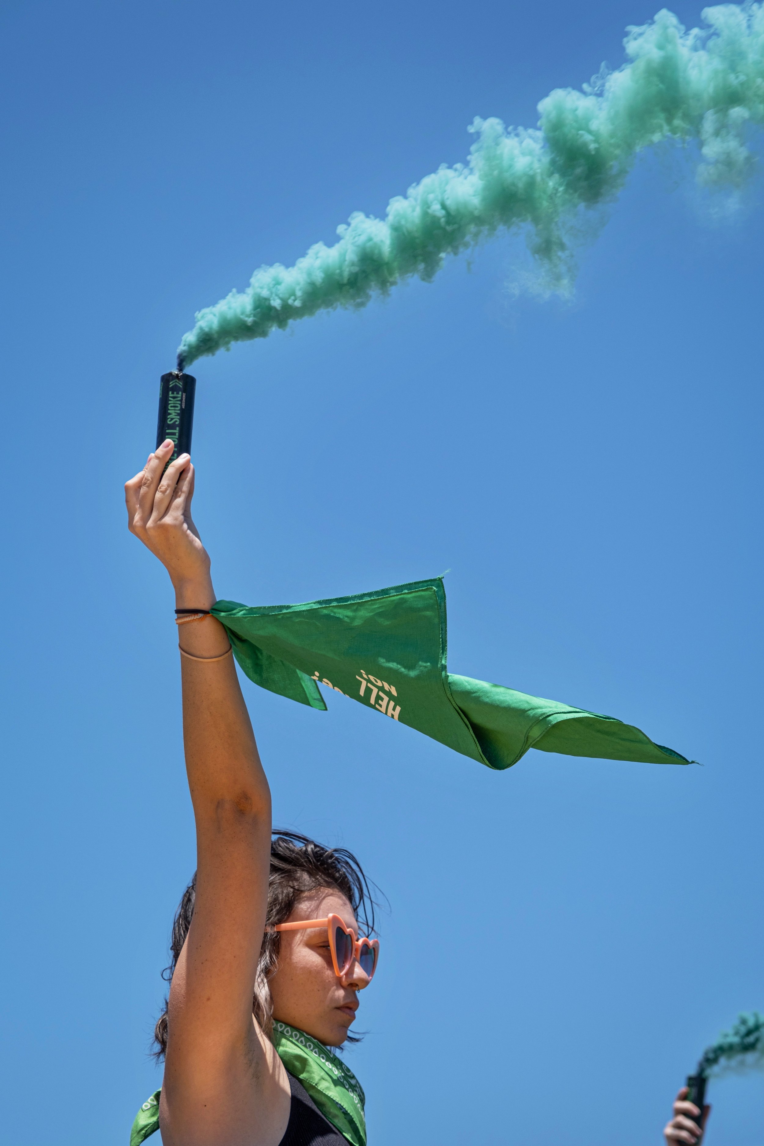  Abortion rights activists use green smoke bombs at an Abortion Rights Rally on the Venice Beach Boardwalk, on July 4. (Anna Sophia Moltke | The Corsair) 