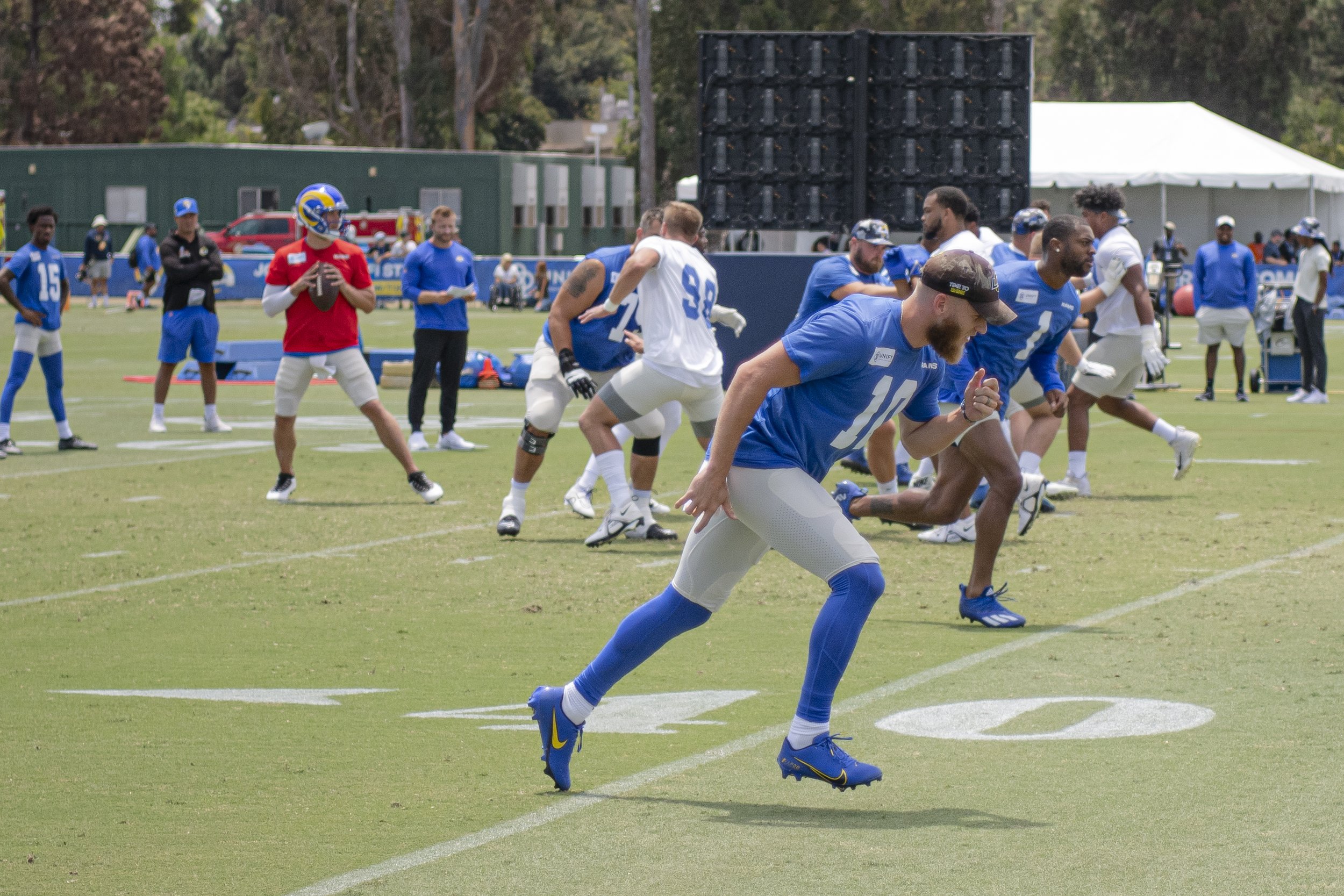  Matthew Stafford the Quarterback for the Los Angeles Rams drops back as he searches for open receivers before the team officially put pads on. (Jon Putman | The Corsair) 