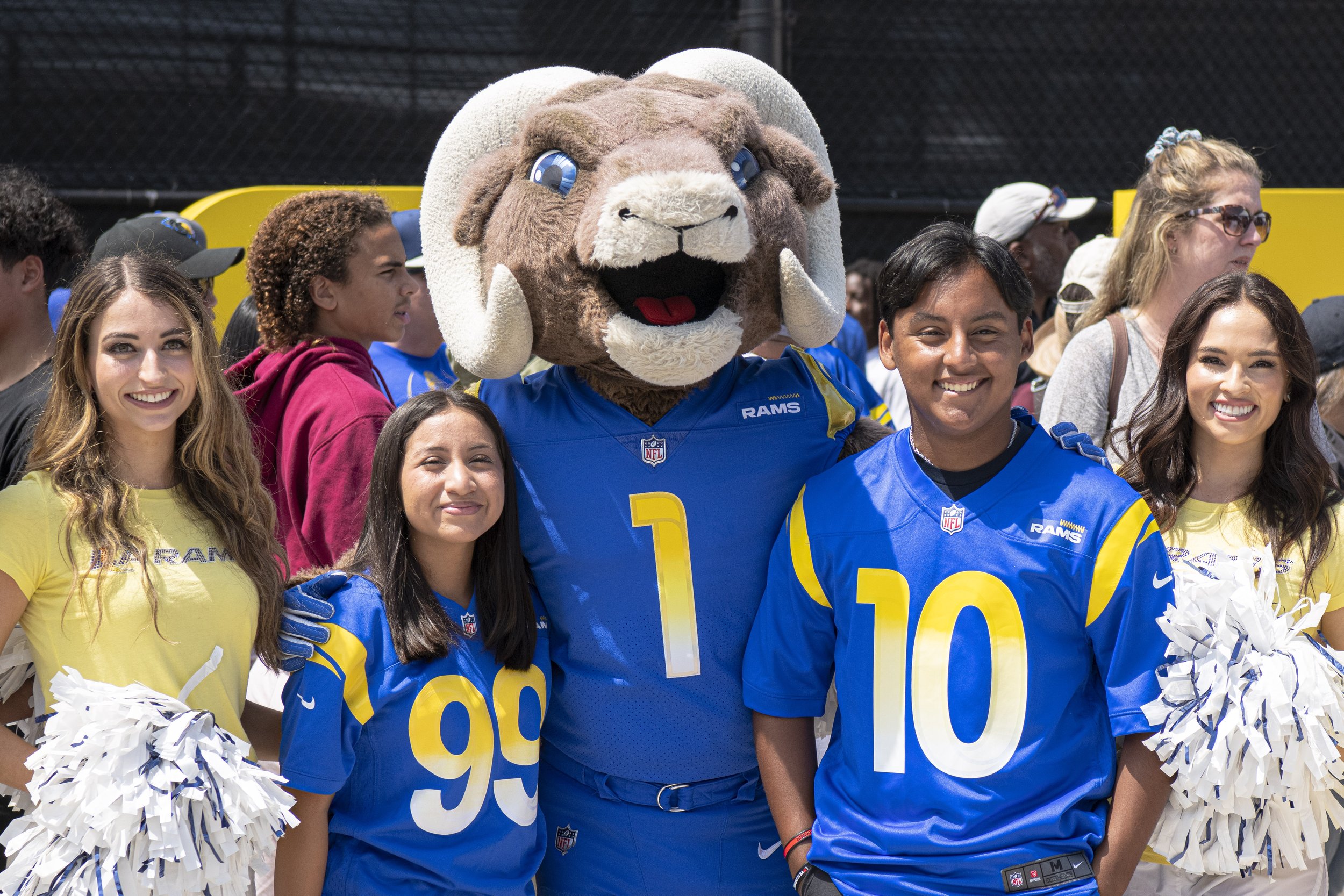  Rams fans pose with Rampage the Rams Mascot and the team Cheerleaders before the gates open to the practice field where the Rams are about to practice for the first time for the 2022-2023 season. (Jon Putman | The Corsair) 