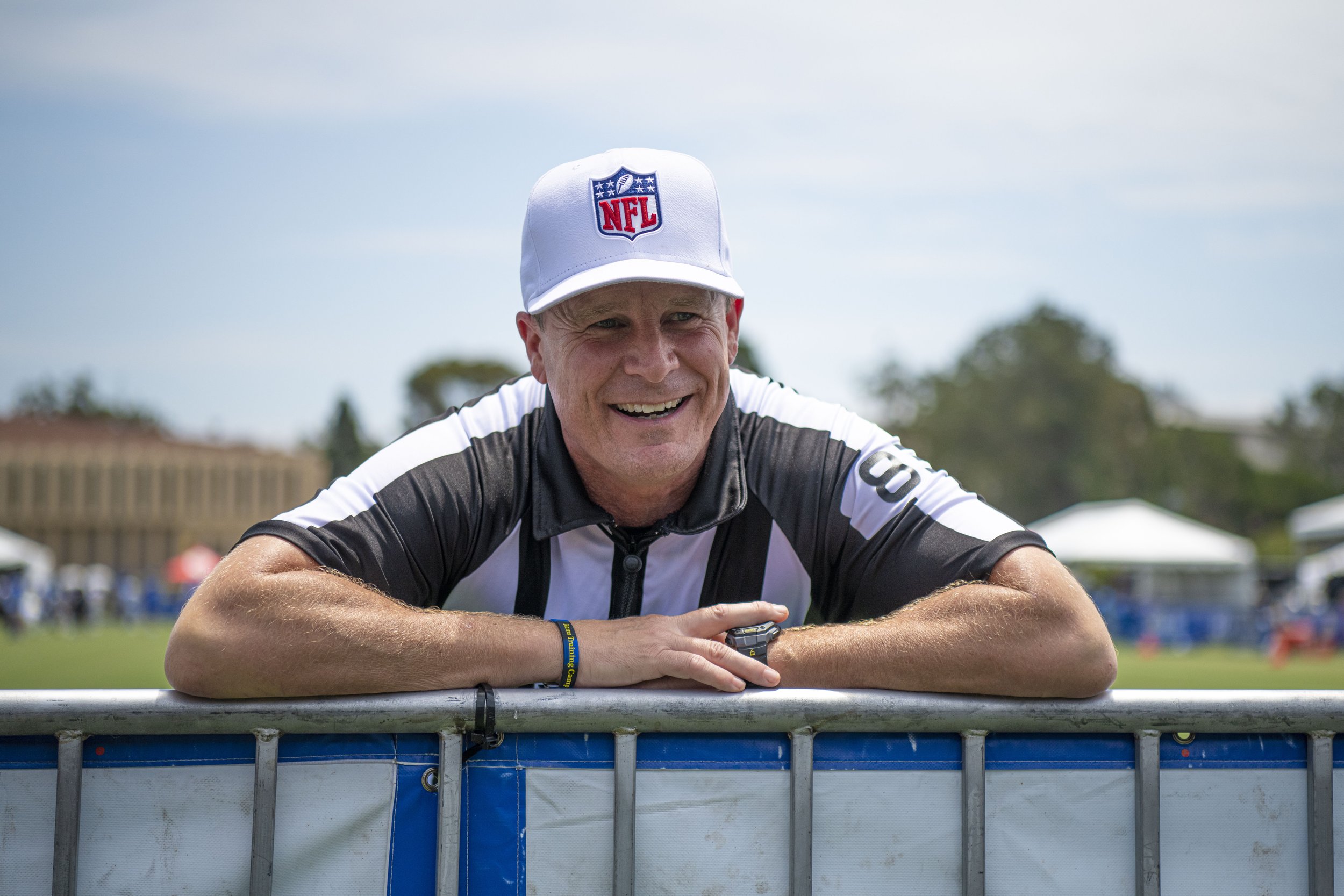  The Head referee for the Rams trainging camp scrimmage chats with fans before the official start to the Rams training camp. (Jon Putman | The Corsair) 