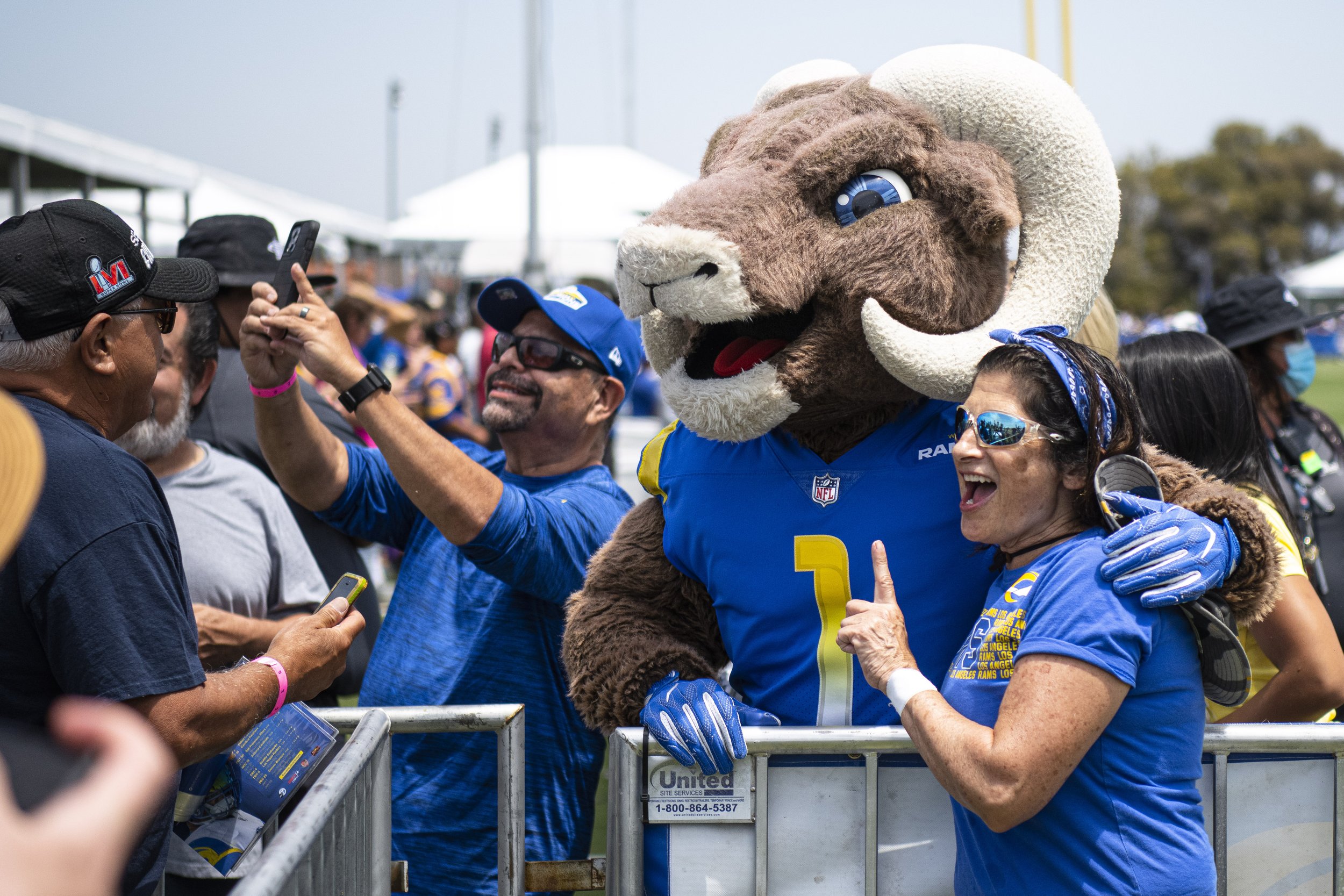  A Los Angeles Ram fan poses with Rampage the Rams Mascott before the team took the field for their first day of training camp. (Jon Putman | The Corsair) 