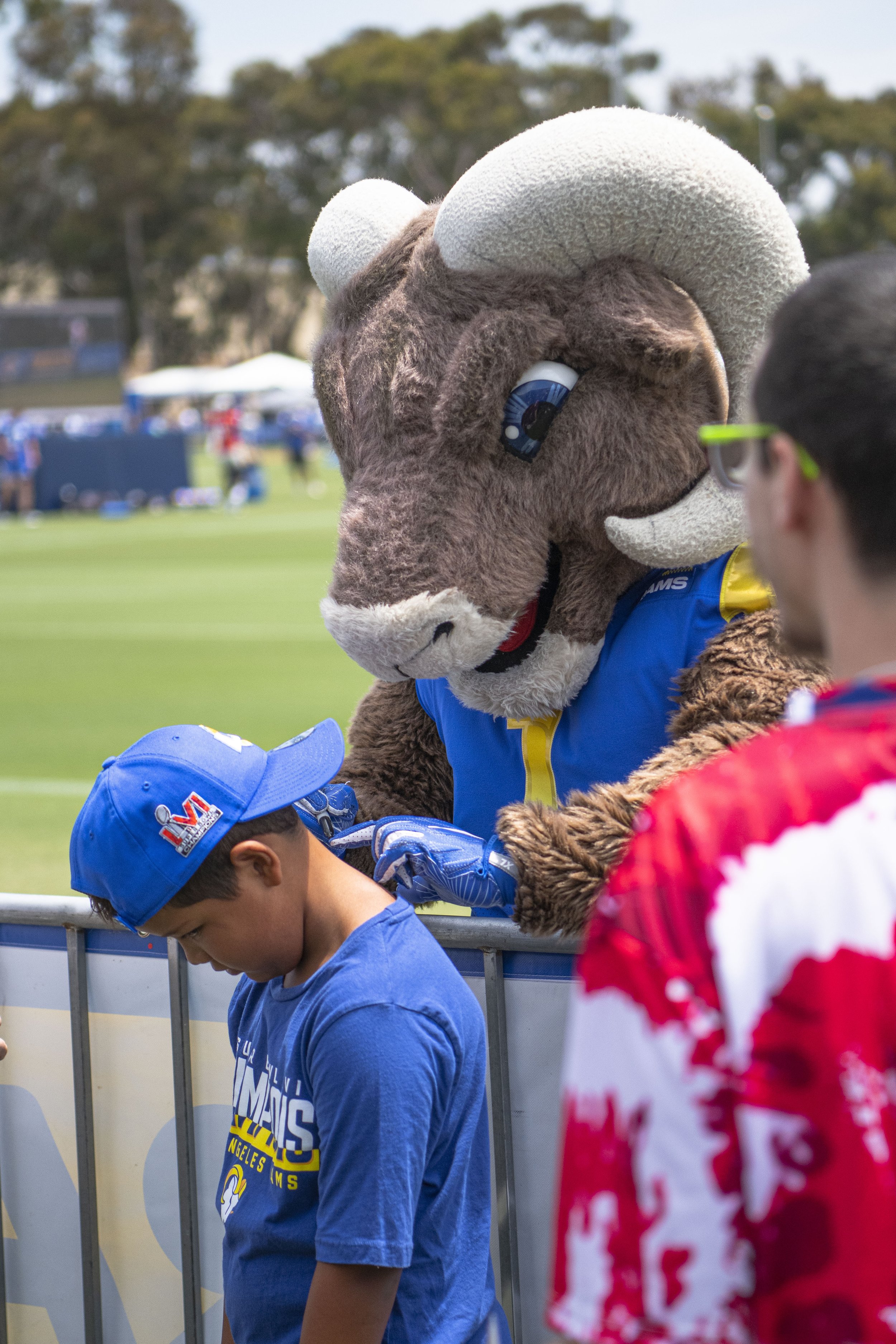  Rampage the Rams mascot signs a jersey for a young fan (Jon Putman | The Corsair) 