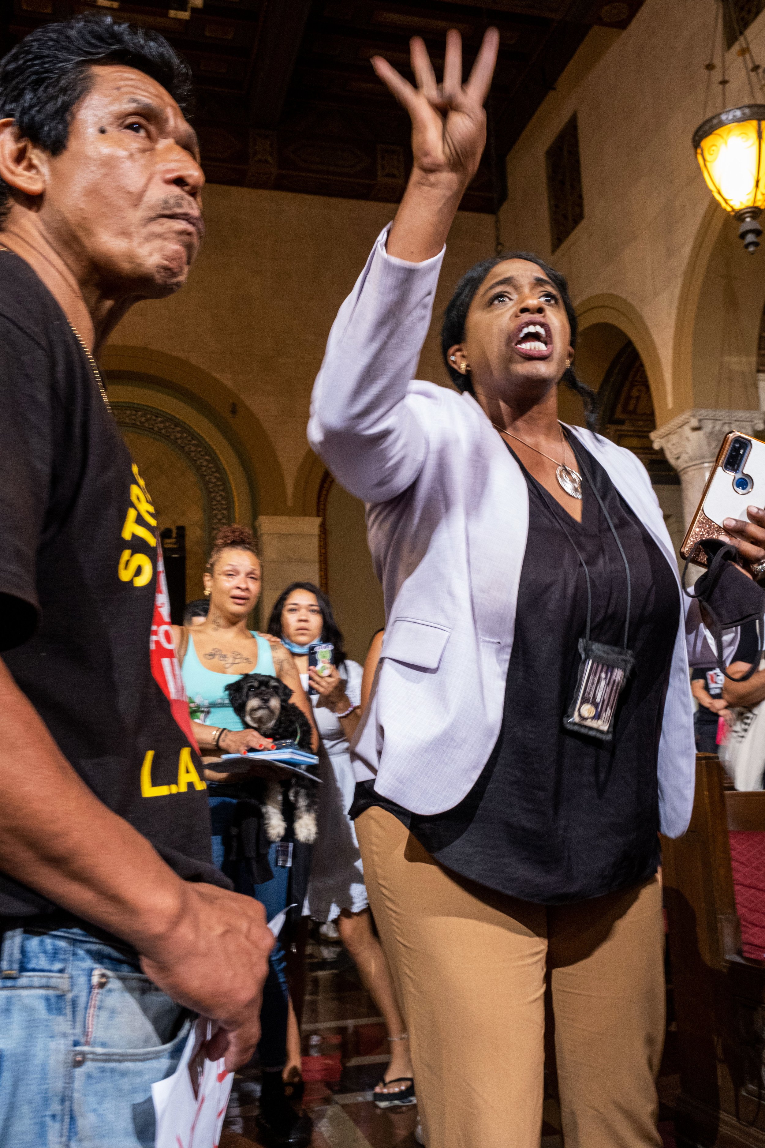  Los Angeles community members and activists voice their frustration after Ricci Sergirnko and Ms. Italy were detained, ending the official public hearing. Los Angeles City Hall on August 9, 2022. (Anna Sophia Moltke | The Corsair) 