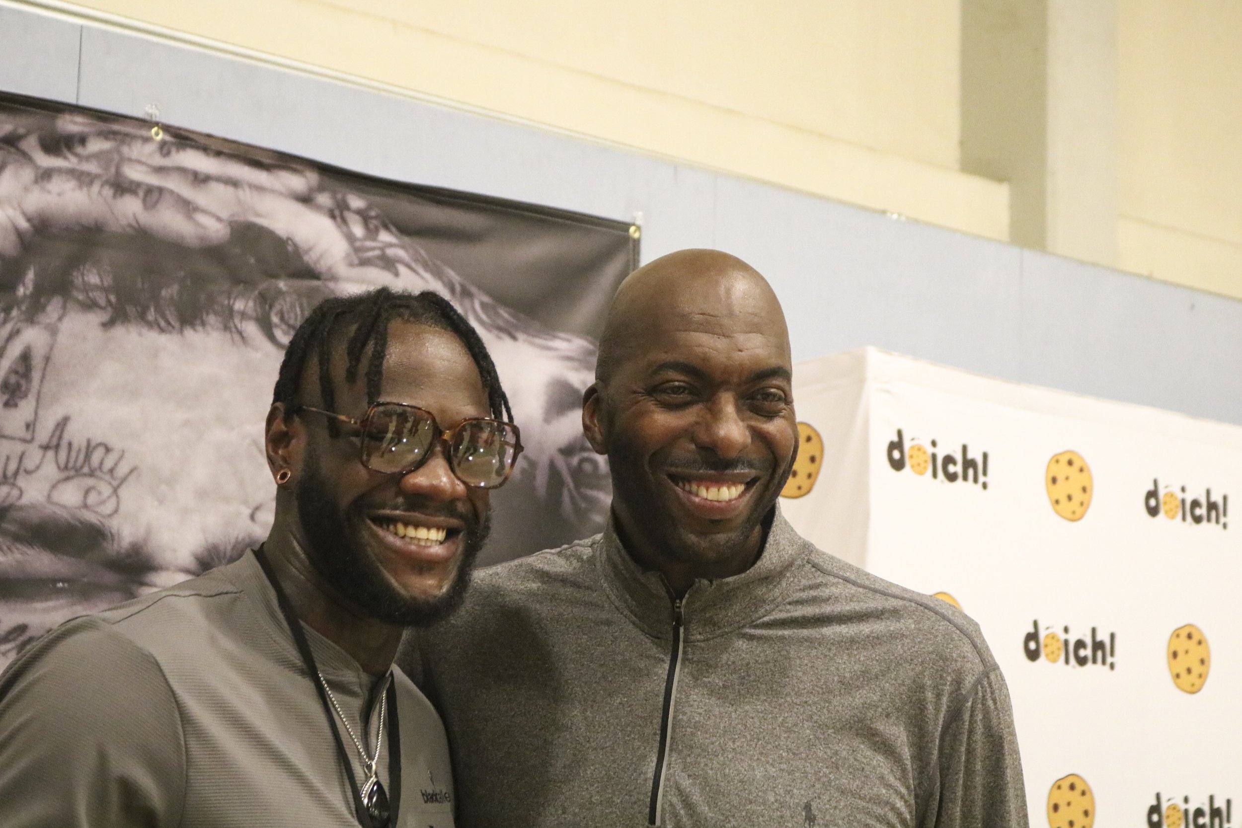  Deontay Wilder (L) and John Salley embrace each other at the first TJ Classic Celebrity All Star Game held at SMC.  (Miguel Castillo | The Corsair) 
