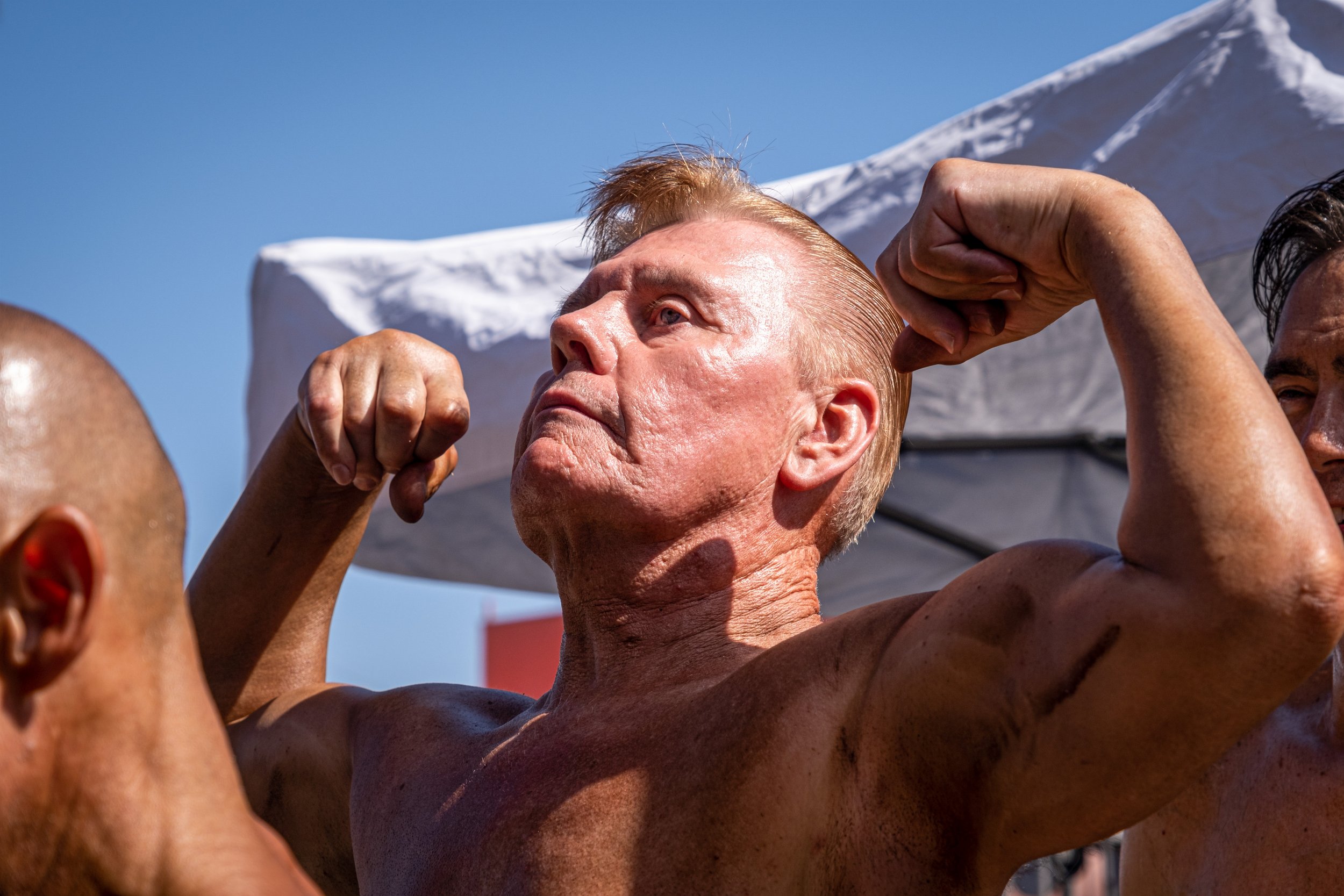  Doug Brolus stands in line to compete in the Master’s Men Over 60 at The Muscle Beach Championship. Brolus used to train with Arnold Schwarzenegger, and still maintains a friendship with him. Venice Beach Recreation Center, in Venice, Calif. on Labo