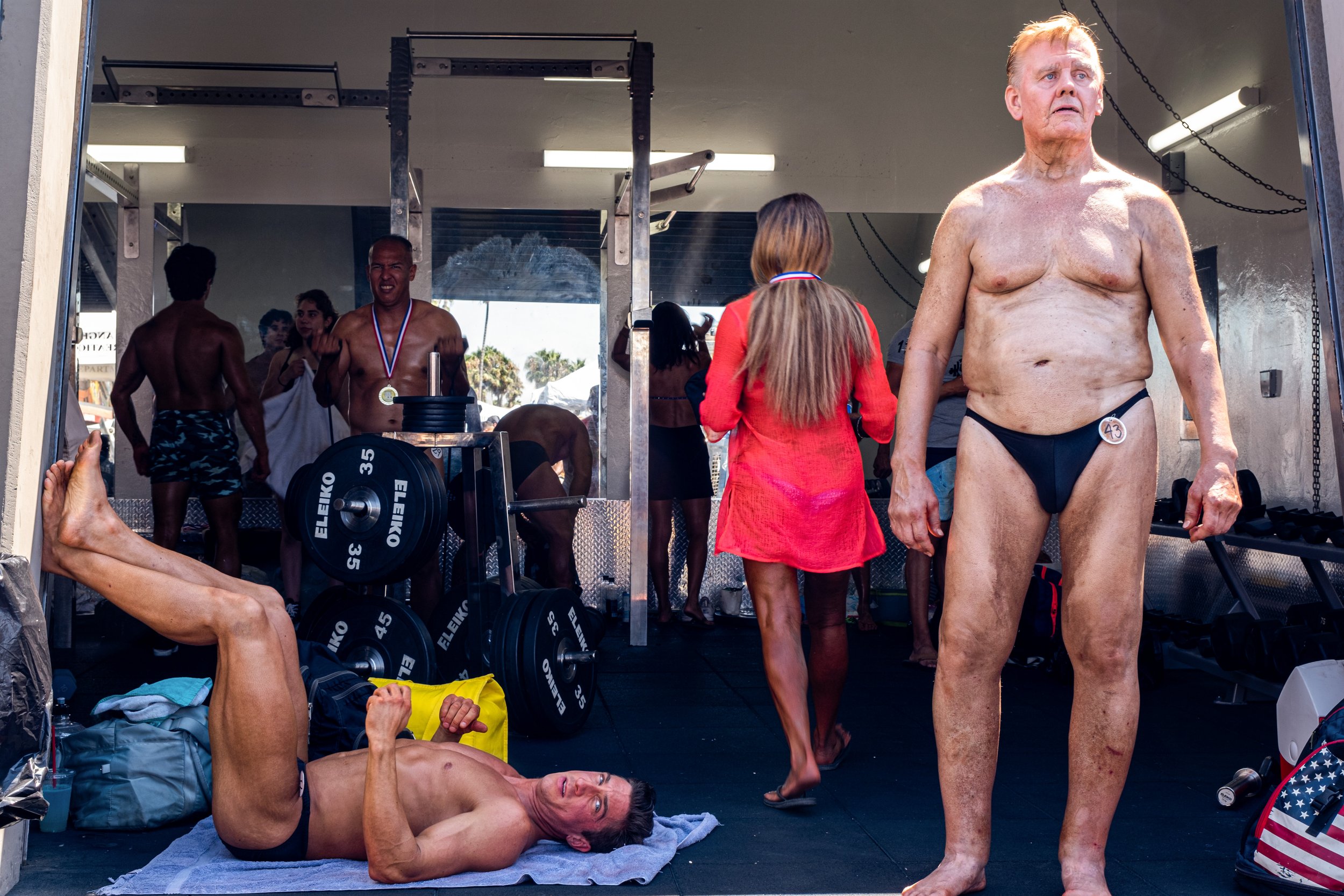  Bodybuilders resting and preparing inside of the training room at The Muscle Beach Championship. Venice Beach Recreation Center, in Venice, Calif. on Labor Day, Monday, September 5, 2022. (Anna Sophia Moltke | The Corsair) 