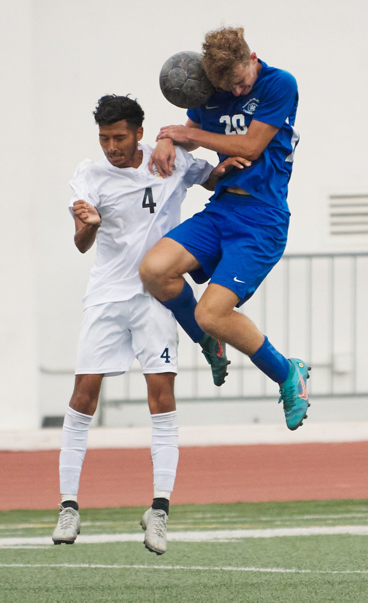  Marcus Hevesy-Rodriguez (right), of the Santa Monica College Corsairs, and Andrew Aguiarcorona (left), of the Los Angeles Harbor College Seahawks, collide during the men's soccer match on Friday, September, 9, 2022, at Corsair Field in Santa Monica,
