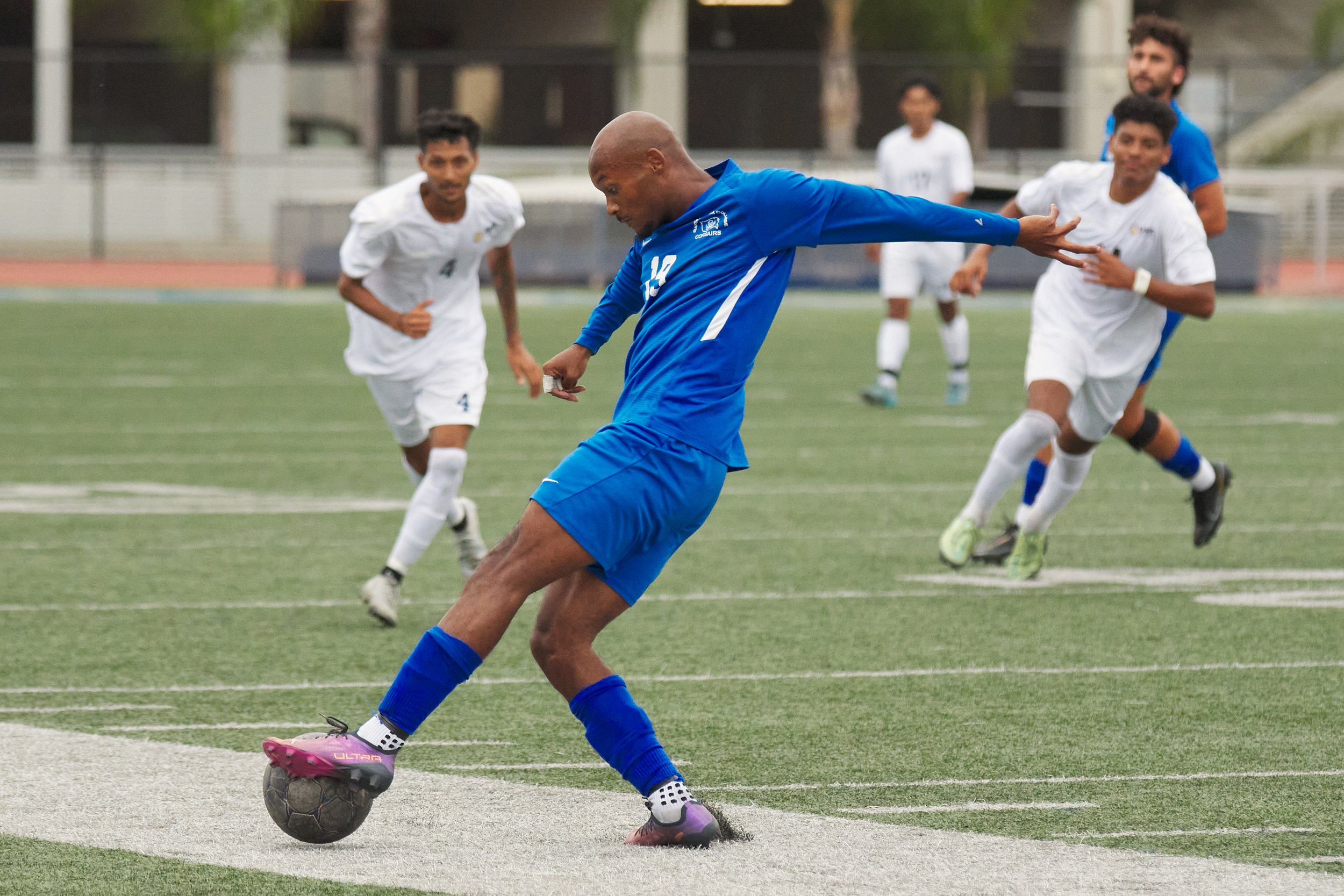  Menes Jahra (center), of the Santa Monica College Corsairs, follwed by Andrew Aguiarcorona (left) and Edwin Gonzales (right), of the Los Angeles Harbor College Seahawks, during the men's soccer match on Friday, September, 9, 2022, at Corsair Field i