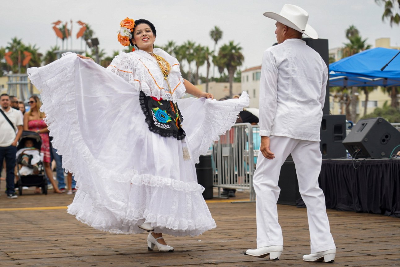  Dancers from the Ballet Folklórico de Santa Monica perform during the End of Summer Car Show in Santa Monica, Calif. Saturday, Sept 10 2022. Folklórico dancers often wear costumes that celebrate traditional Mexican folkloric characters. (Anthony Cli
