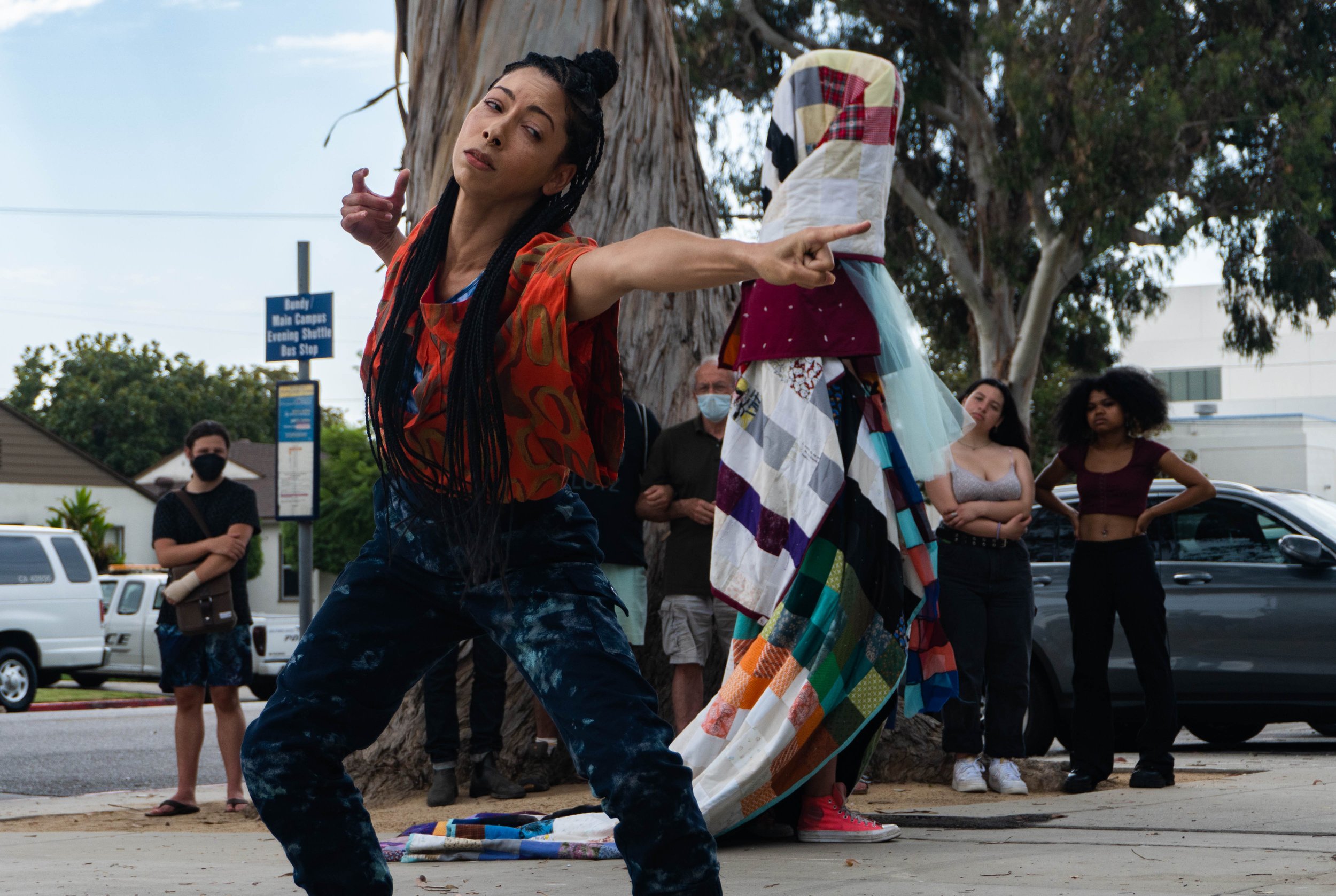  Stacey Lynn Smith, Catalyst performer performs the second part of 'Being Future Being: Land/Celestial' with an interpretative dance as performance partner, Jasmine Shorty circles the Blue Gum tree draped in colorful handmade quilts. Smith's boyfrien