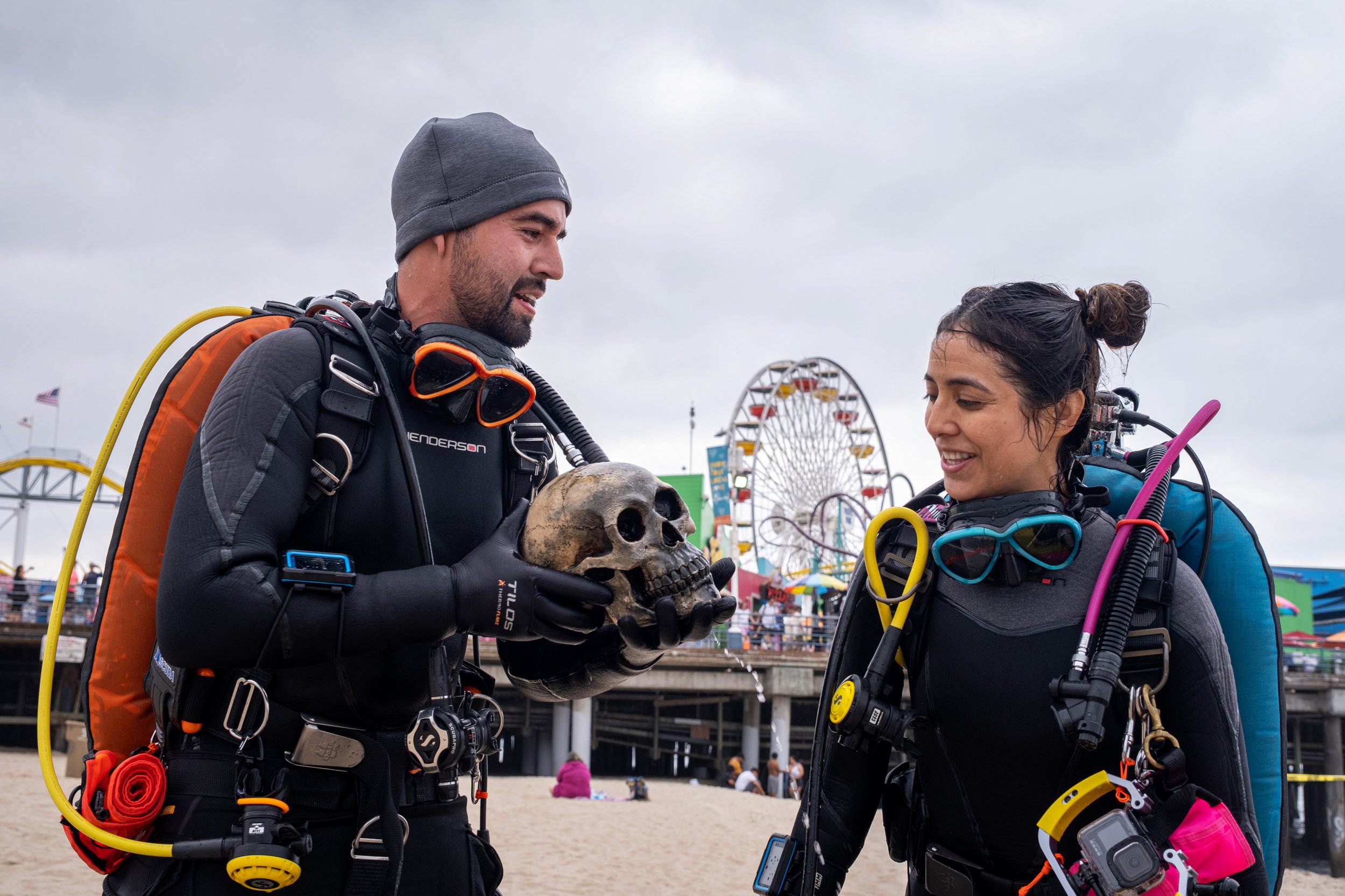  Alvin and Alma Alvarez, (L to R) members of Eco Dive Center, hold a skull that they collected on their dive below the water surrounding the Santa Monica Pier. Coastal Cleanup Day, led by Heal The Bay in Santa Monica Calif. on Saturday, September 17,