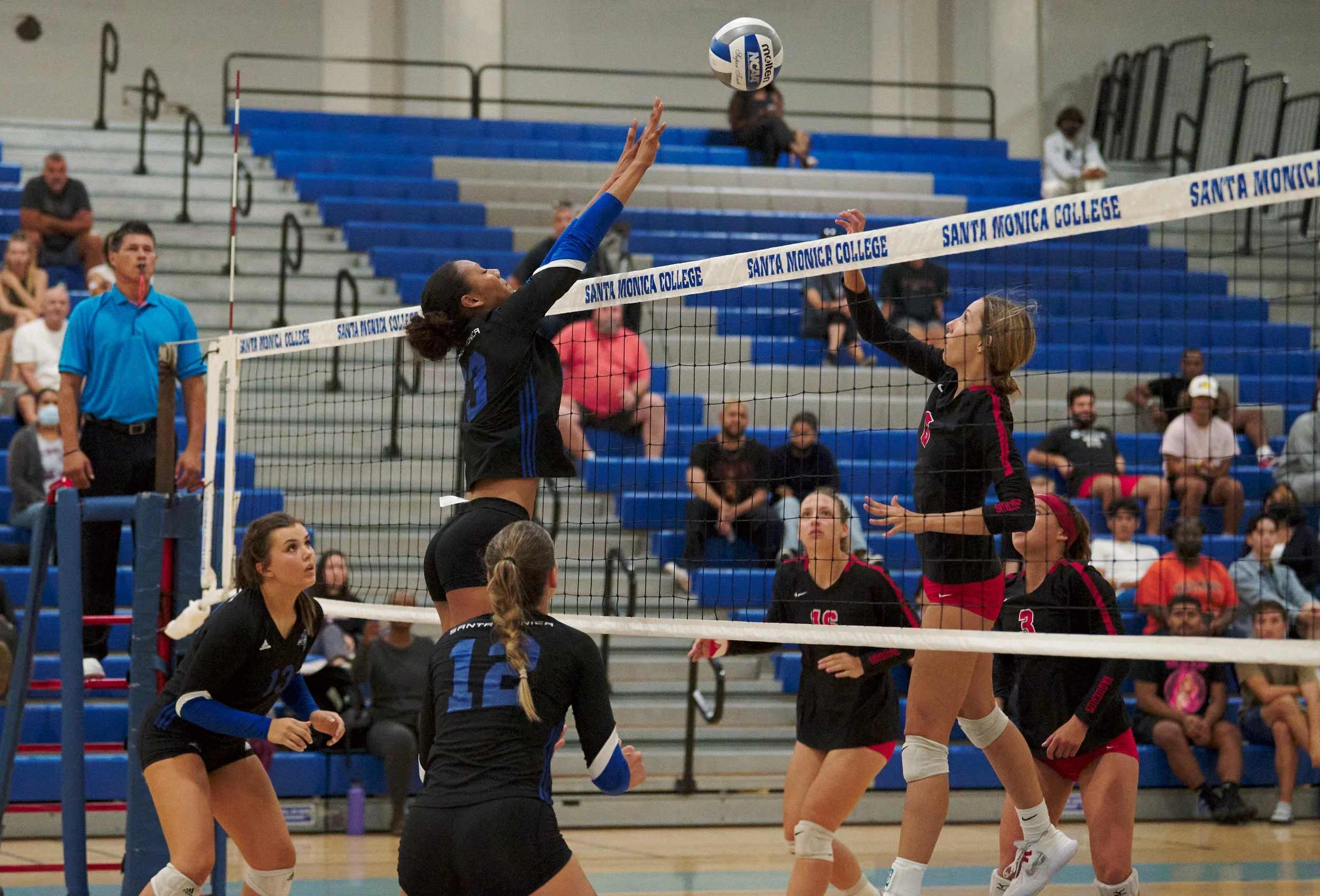 The Women's Volleyball game between the Santa Monica College Corsairs and the Santa Barbara City College Vaqueros, Rain Martinez (center left) and Heidi Collins (center right). The Corsairs won 3-1 on Friday, Sept. 16, 2022 at the Corsair Gym in San