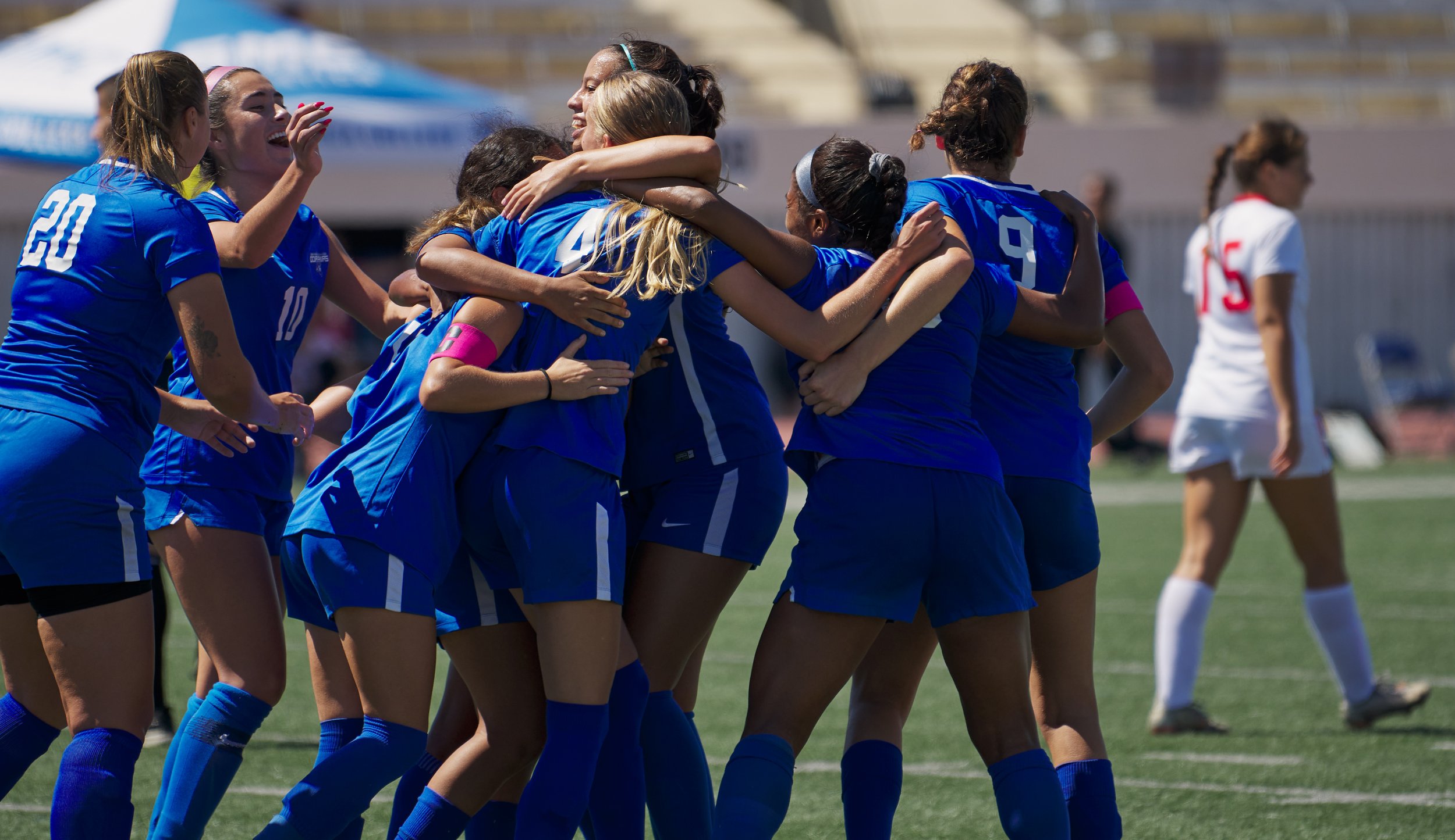  Members of the Santa Monica College Corsairs Women's Soccer Team celebrate Emma Rierstam's (4, center) goal early in the game against the Santa Barbara City College Vaqueros on Tuesday, Sept. 20, 2022, at Corsair Field in Santa Monica, Calif. (Nicho