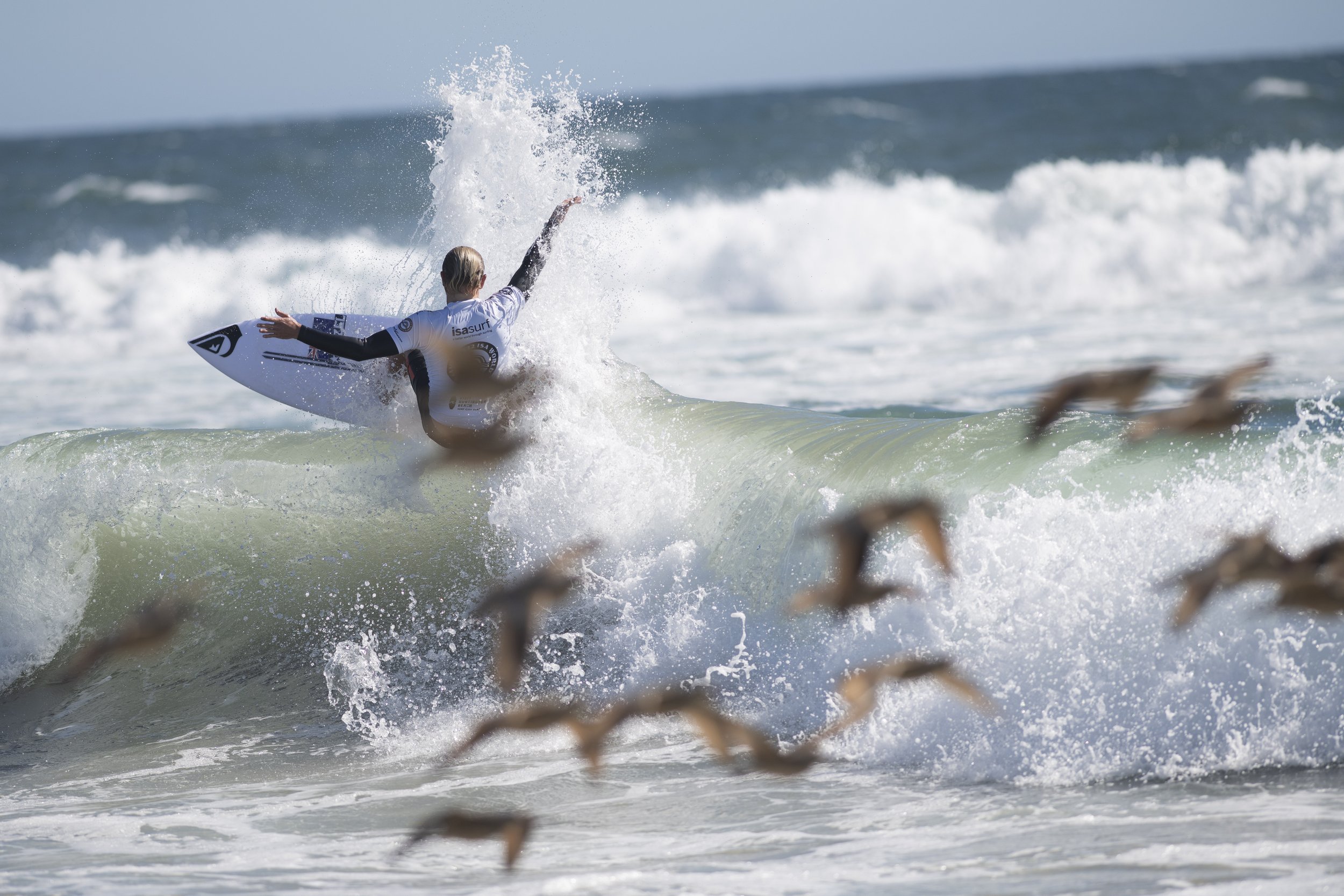  Joel Vaughn from Australia peforms a carve move at the ISA World Surfing Games. (Jon Putman | The Corsair) 