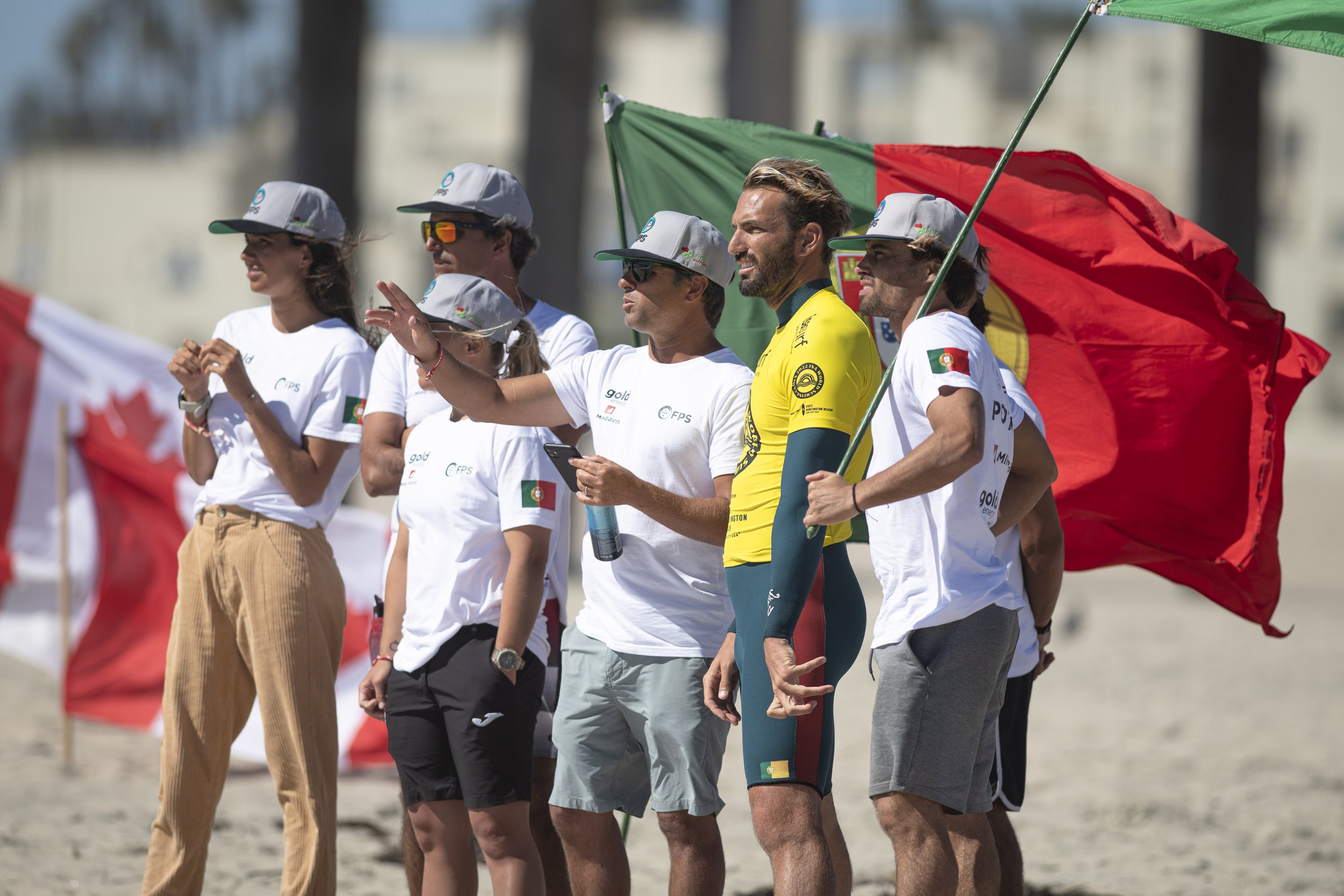  Darshan Antequera from Costa Rica observes the waves with his team before he makes his first qualification attempt. (Jon Putman | The Corsair) 