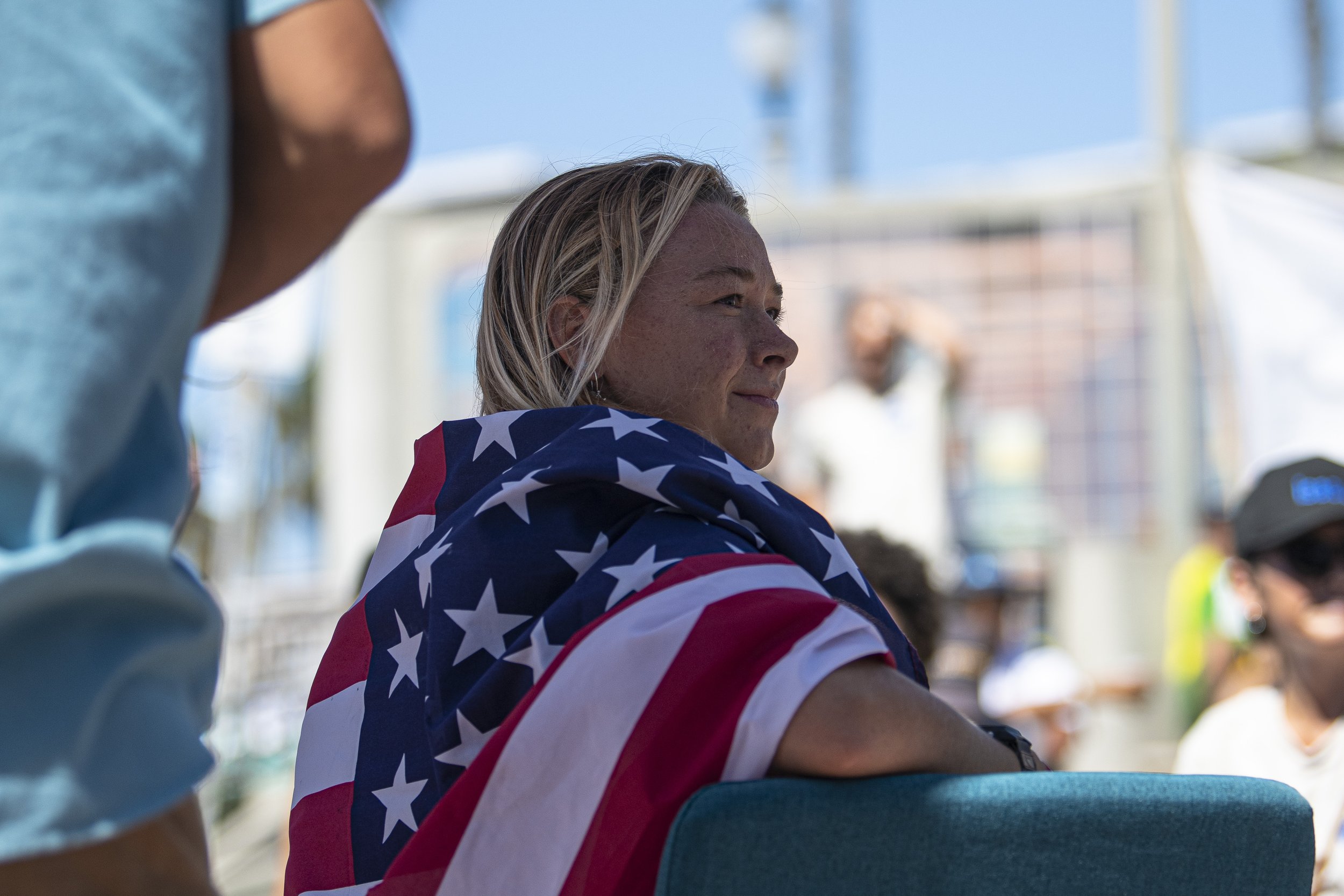  Kirra Pinkerton from team USA waits to receive her Gold medal that she earned at the ISA World Surfing Games qualifying her for the 2024 Paris Olympics. (Jon Putman | The Corsair) 