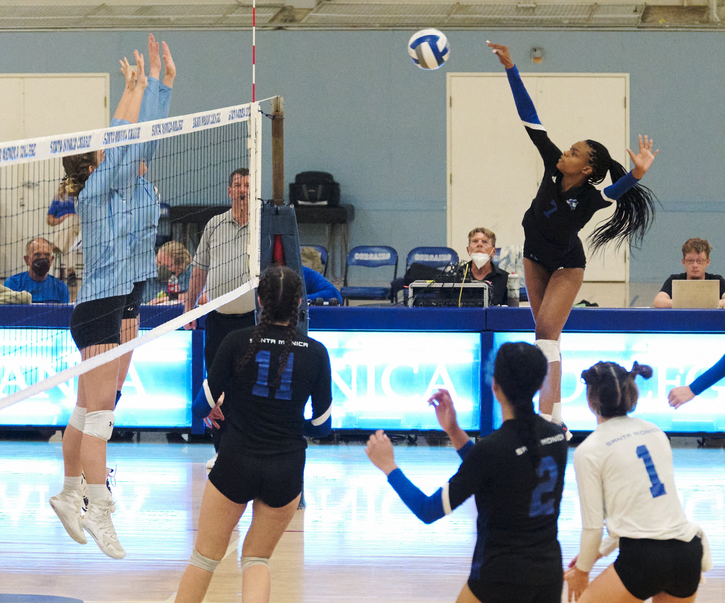  Santa Monica College Corsairs' Zarha Stanton (right) hits the ball during the women's volleyball match against the Moorpark College Raiders on Friday, Sept. 23, 2022, at the Corsair Gym in Santa Monica, Calif. The Corsairs won 3-2. (Nicholas McCall 