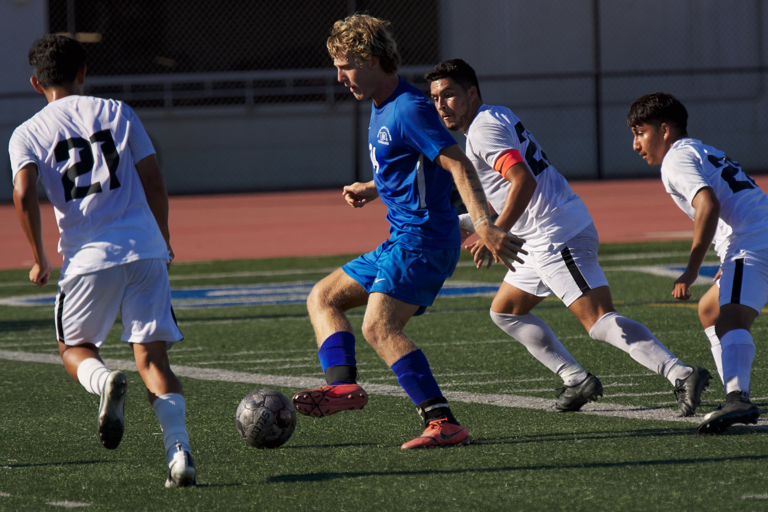 Santa Monica College Corsairs' Alexander Lalor (center left), and Rio Hondo College Roadrunners' Ruben Gonzales (left), Malachi Hernandez (center right), and Juan Flores (right) during the men's soccer match on Friday, Sept. 24, 2022, at Corsair Fie