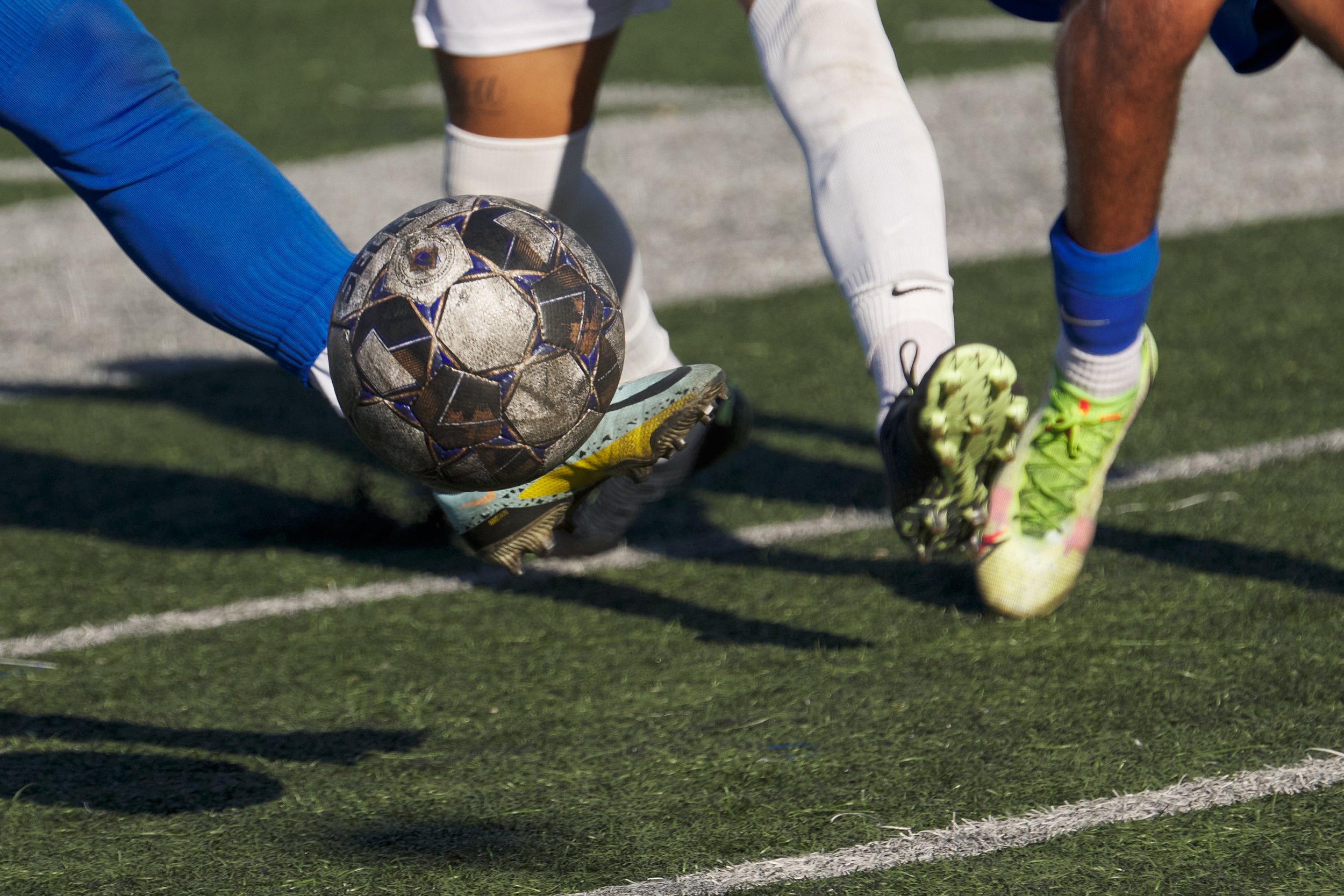  A closeup of players' legs and the ball during the men's soccer match between the Santa Monica College Corsairs and the Rio Hondo College Roadrunners at Corsair Field on Friday, Sept. 23, 2022, in Santa Monica, Calif. (Nicholas McCall | The Corsair)