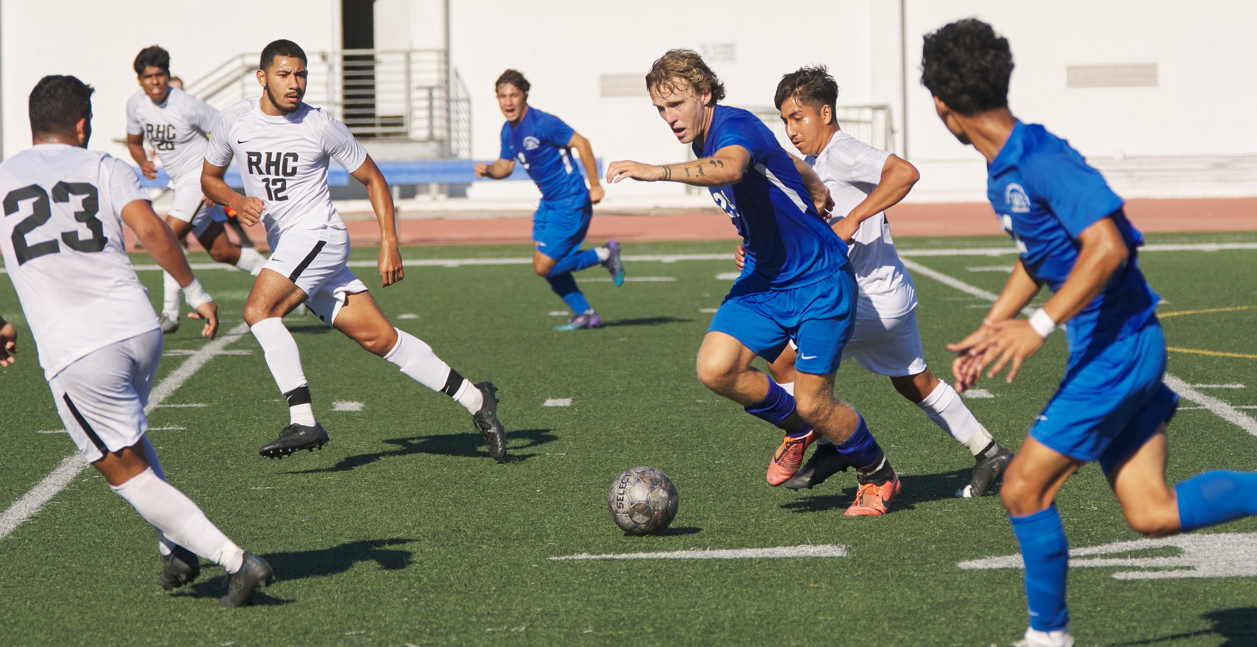  Santa Monica College Corsairs' Alexander Lalor (third from right) and Rio Hondo College Roadrunners' Alexis Perez (third from left) during the men's soccer match on Friday, Sept. 24, 2022, at Corsair Field in Santa Monica, Calif. The Corsairs won 2-