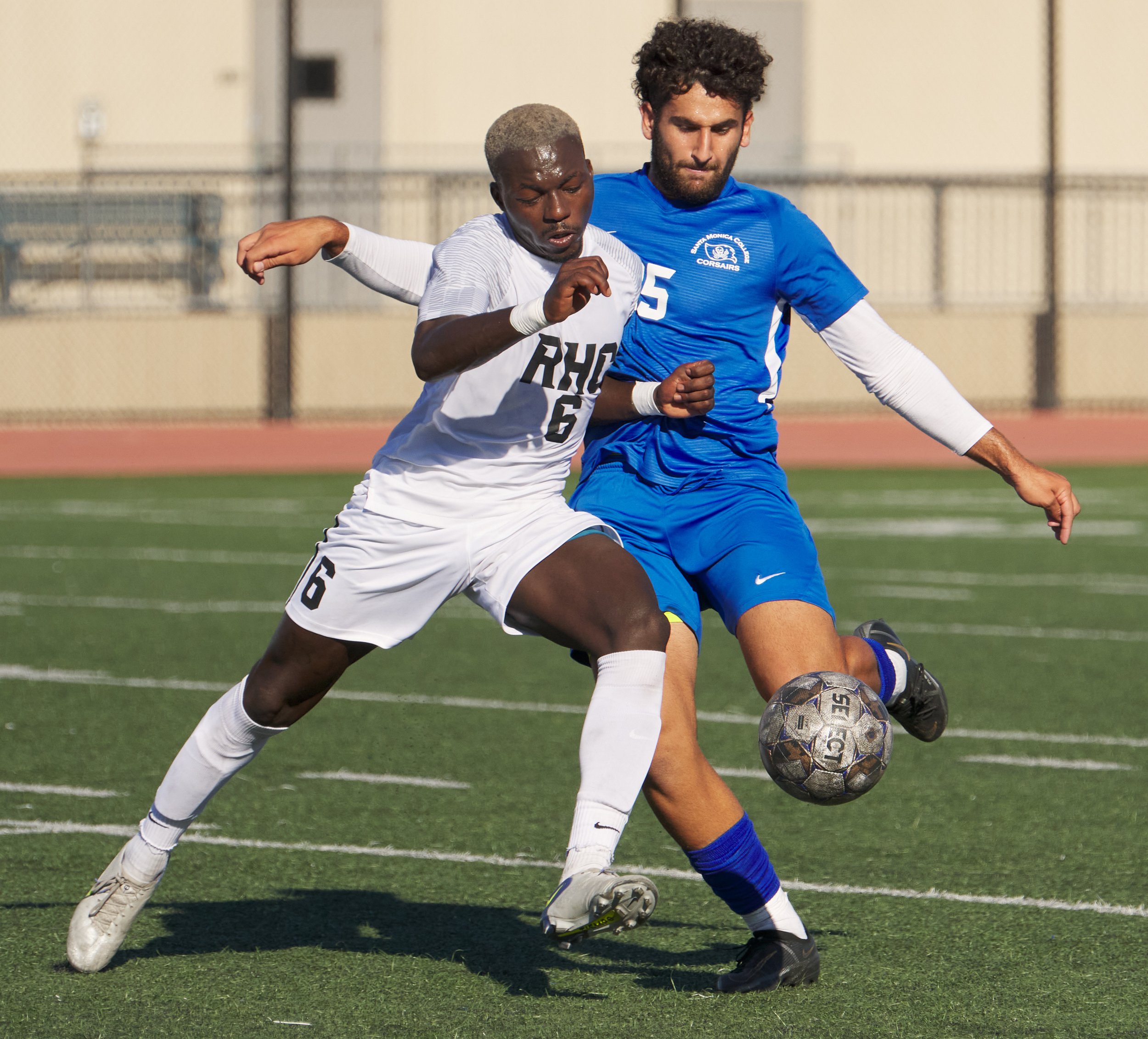  Santa Monica College Corsairs' Adam Abou-Hamad (right) and Rio Hondo College Roadrunners' Ebenezer Chinne (left) during the men's soccer match on Friday, Sept. 24, 2022, at Corsair Field in Santa Monica, Calif. The Corsairs won 2-1. (Nicholas McCall