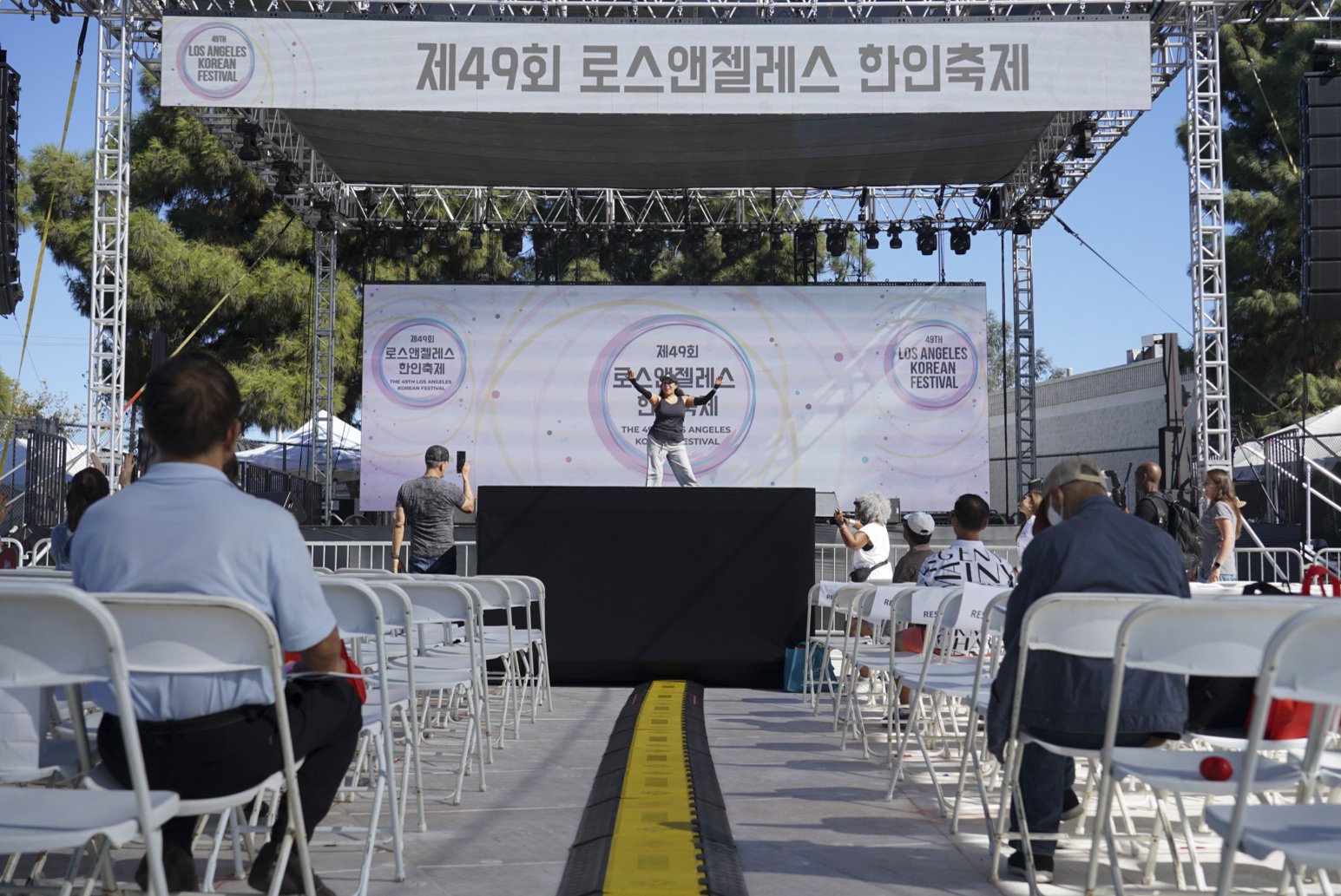  An instructor from the Wallis Annenberg GenSpace hosts a Get Up and Move class during the 49th annual Los Angeles Korean Festival Friday, September 23 2022 at the Seoul International Park. The GenSpace offers a variety of classes and community event