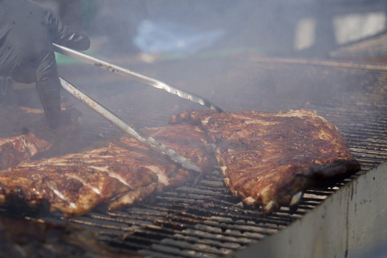  A grillmaster prepares pork belly and barbeque during the 49th annual Los Angeles Korean Festival Friday, September 23 2022 at the Seoul International Park. Vendors offered tradition street food representing all eight provinces of Korea during the t