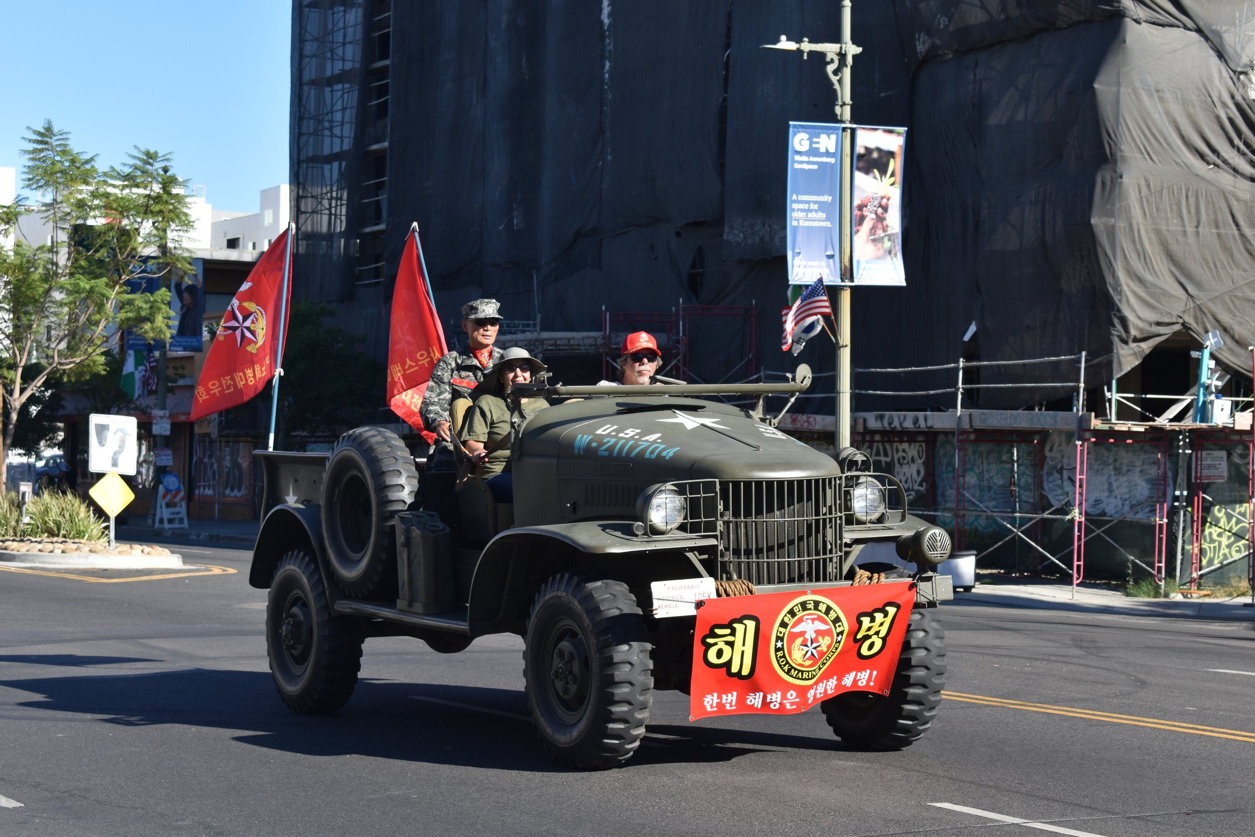  Marine corps vehicle cruises down West. Olympic Boulevard. on Saturday, Sept, 24. in Koreatown Los Angeles, Calif. for the 49th annual Korean Festival parade. (Guadalupe Perez | The Corsair) 