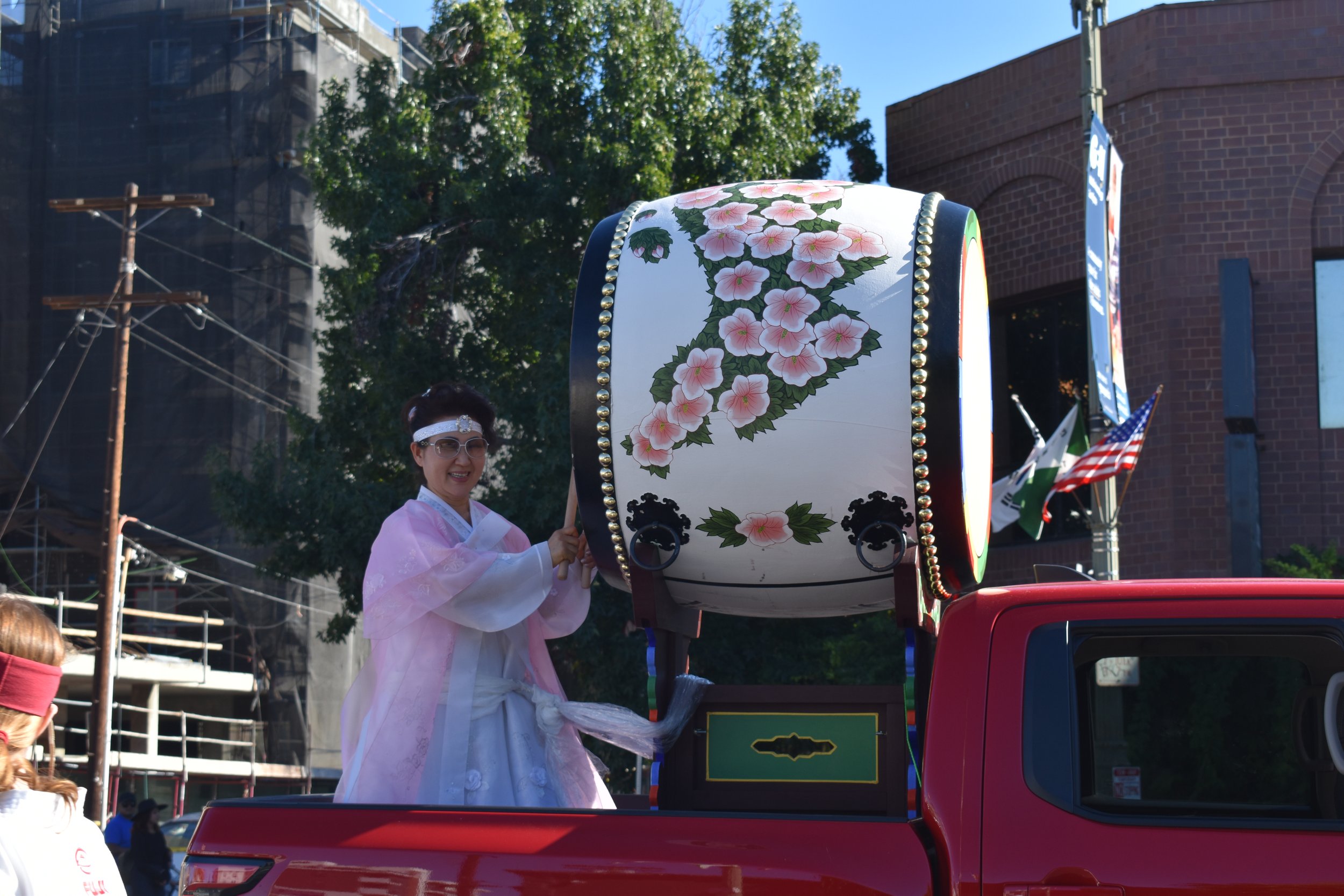 Traditional Korean performer plays a traditional Korean drum known as the Buk while being driven in a red pick up truck for the 49th annual Korean Festival parade in Koreatown, Los Angeles, Calif. on Saturday, Sept. 24. (Guadalupe Perez | The Corsai