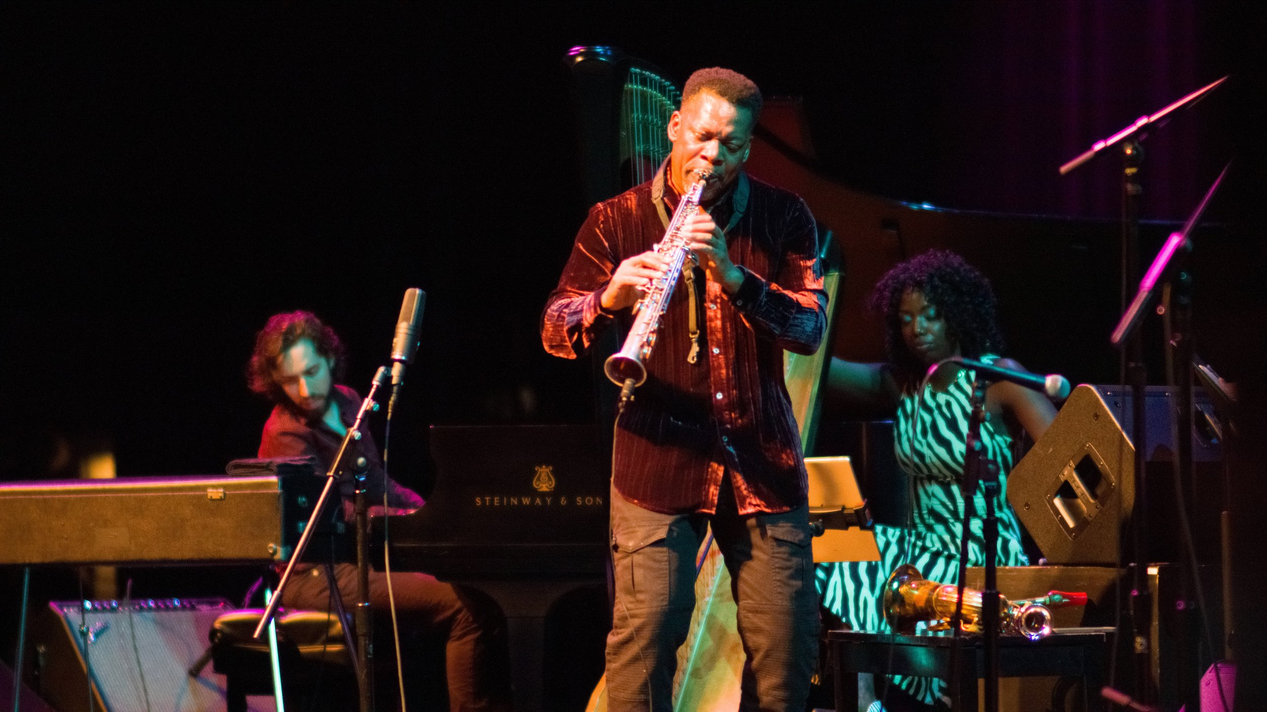  Gadi Lehavi (left) with Ravi Coltrane (center) and Brandee Younger (right) play at the Santa Monica College Performing Arts Center, Santa Monica, Calif. as part of Ravi Coltrane's group on It was the birthday of Ravi Coltrane's late father John Colt