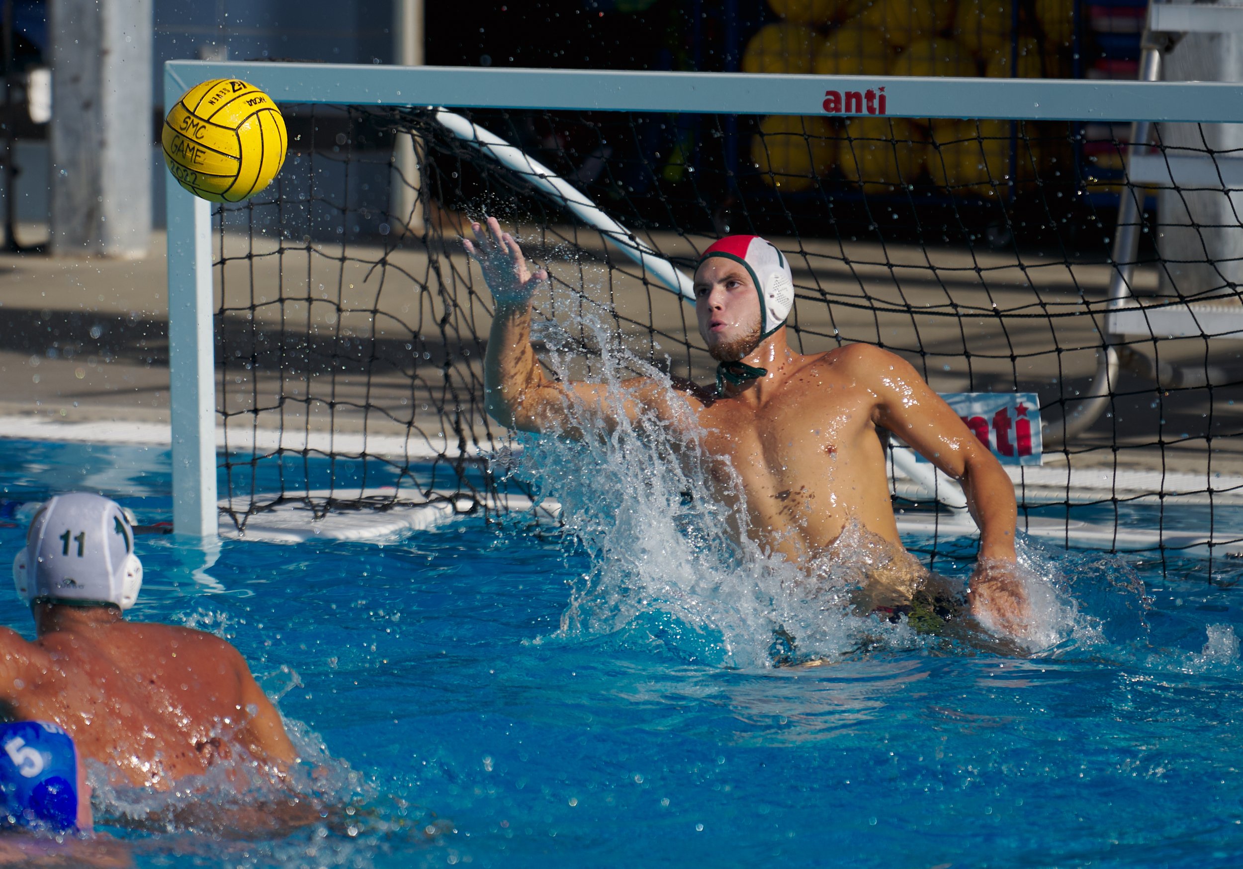  Los Angeles Valley College Monarchs Men's Water Polo Goalie, Daniel Smkovsky, blocks the ball during the men's water polo match on Wednesday, Sept. 28, 2022, at the Santa Monica College Aquatics Center in Santa Monica, Calif. The Corsairs lost 23-4.
