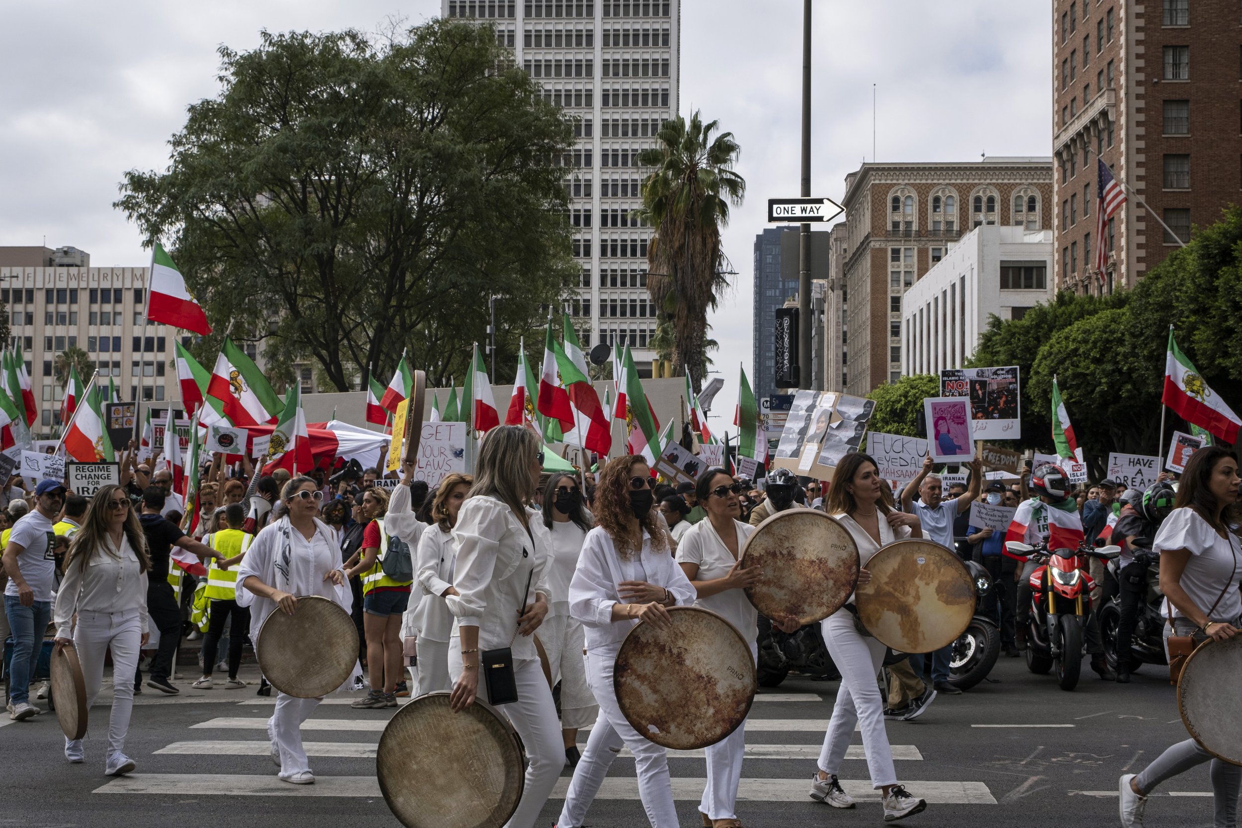  Drummers cross the street in front of Pershing Square, before the march to City Hall for the Freedom Rally for Iran, in Downtown Los Angeles, Calif., on October 1. (Anna Sophia Moltke | The Corsair) 