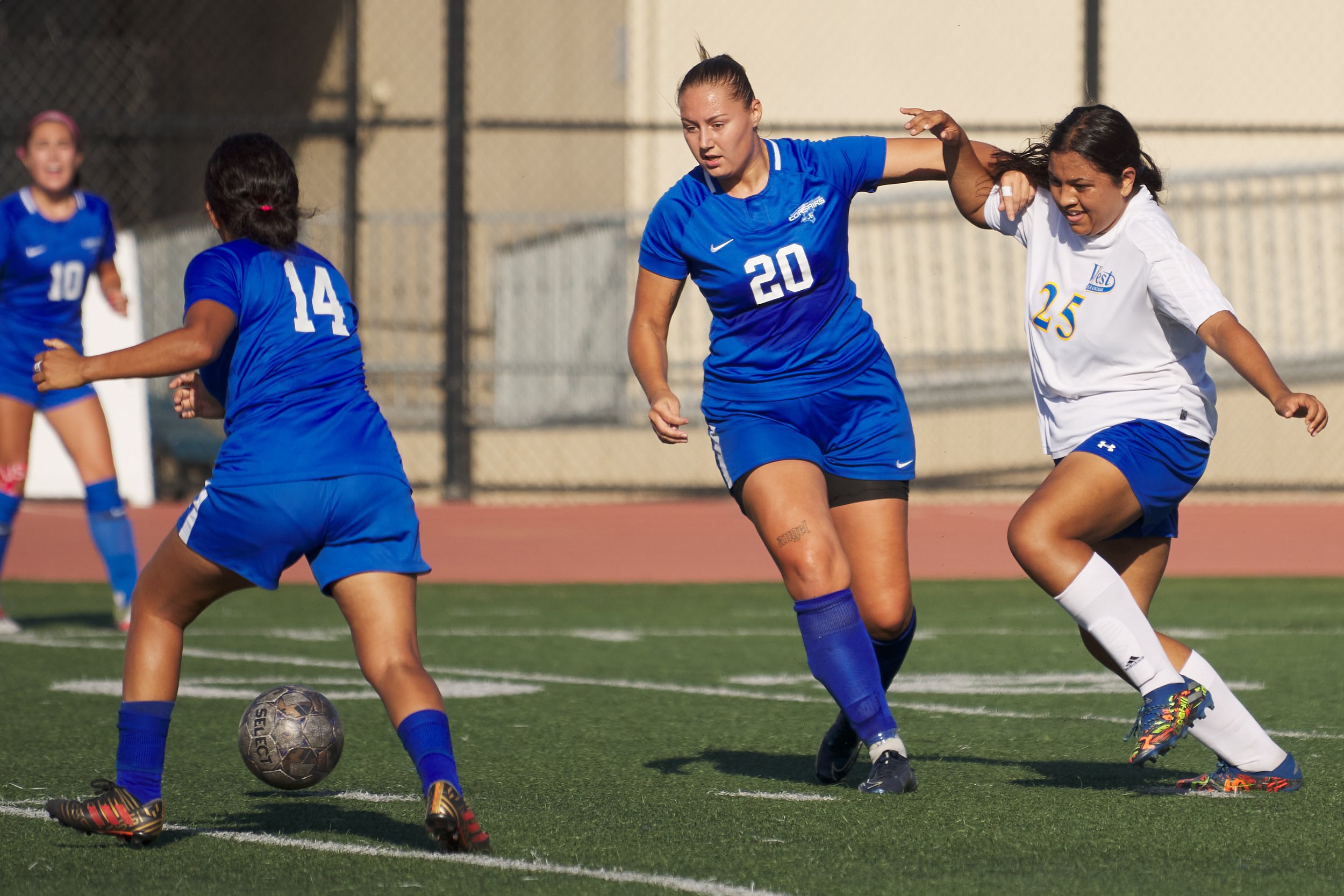  Santa Monica College Corsairs' Alicia Edberg (center) defends Vashti Zuniga (left) from West Los Angeles College Wildcats' Marlene Roa (right) at the women's soccer match on Friday, Sept. 30, 2022, at Corsair Field in Santa Monica, Calif. The Corsai