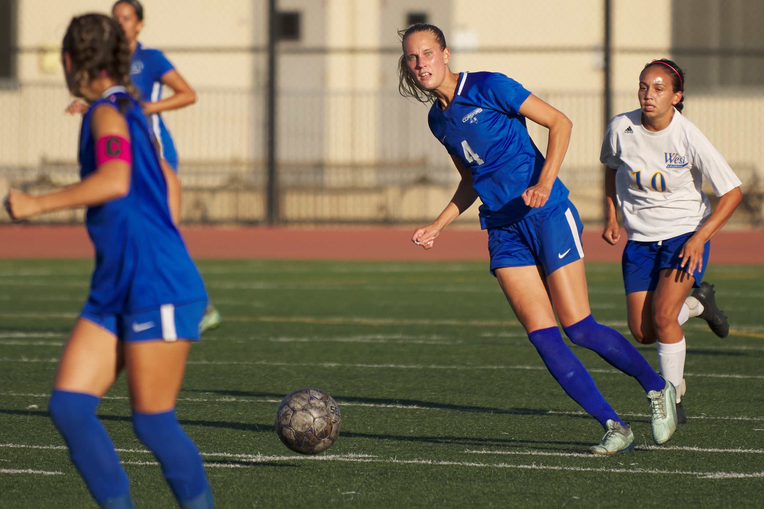  With West Los Angeles College Wildcats' Leslie Flores (right) close behind, Santa Monica Corsairs' Emma Rierstam (center) sends the ball to Sophie Doumitt (left) during the women's soccer match on Friday, Sept. 30, 2022, at Corsair Field in Santa Mo