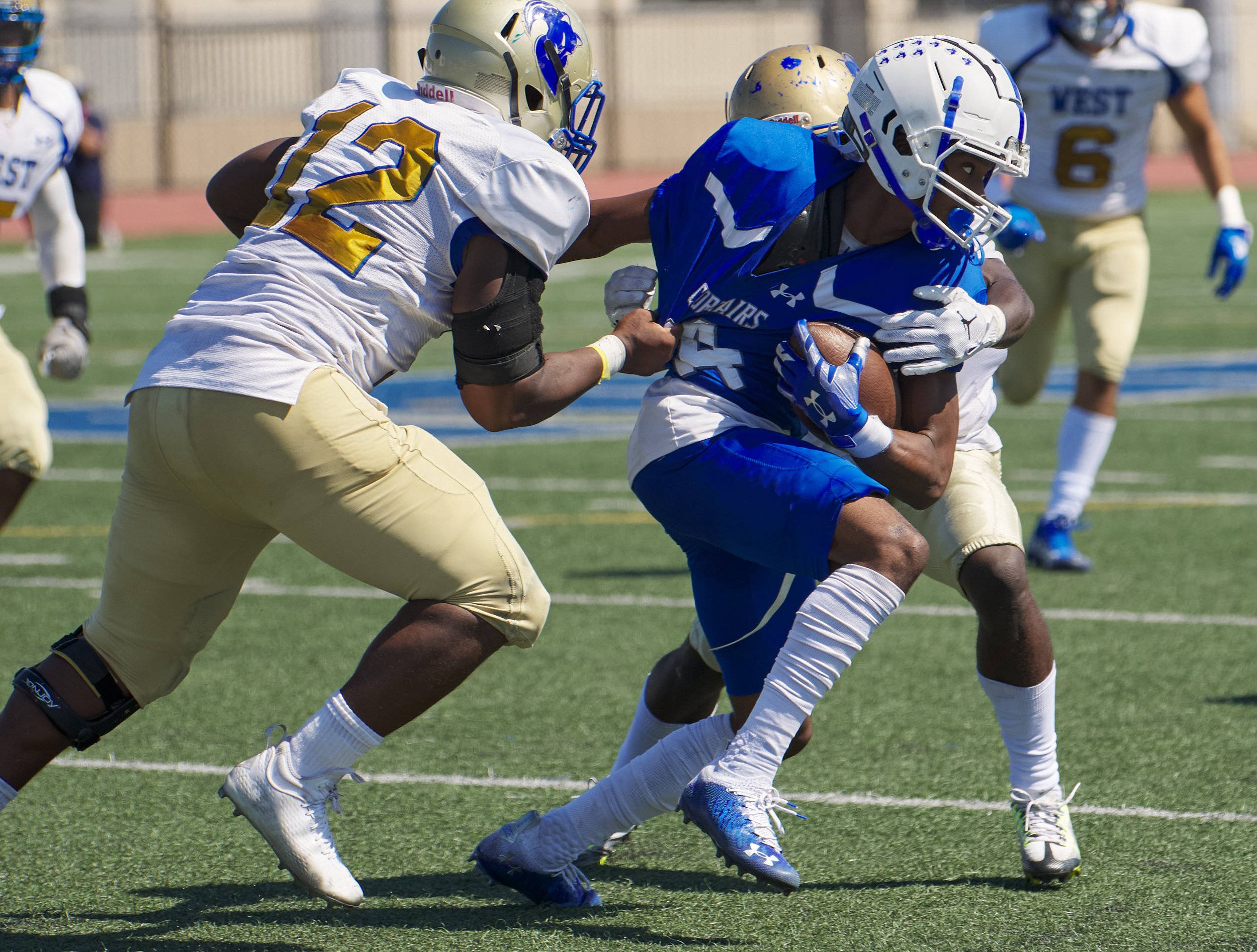  Santa Monica College Corsairs' Jaboree Thornton begins to get tackled by the West Los Angeles College Wildcats during the football match on Saturday, October 1, 2022, at Corsair Field in Santa Monica, Calif. The Corsairs won 41-40. (Nicholas McCall 